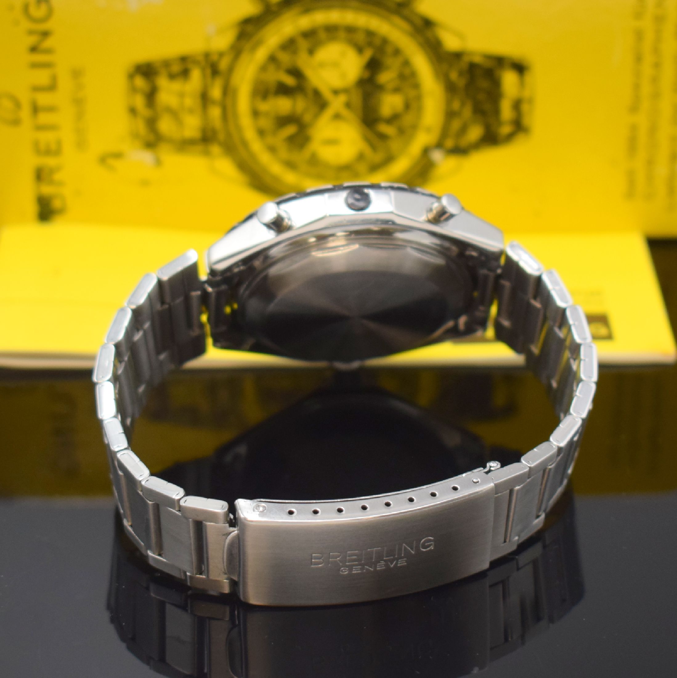 Detail b: BREITLING Armbandchronograph Navitimer Chrono-Matic Referenz 1808, Schweiz um 1972, Edelstahlgeh. inkl. orig. Gliederband m. Faltschl., Boden ...