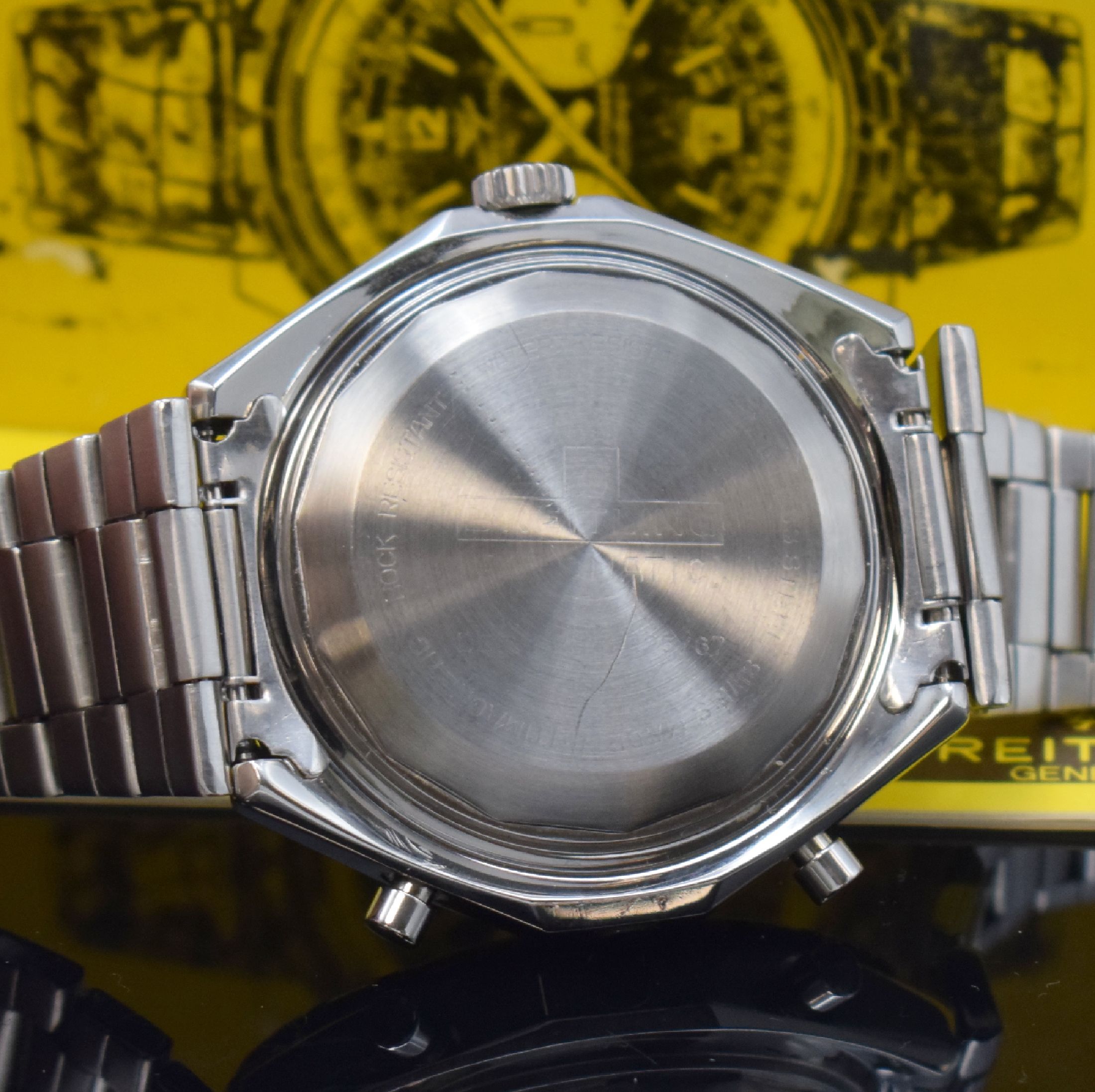 Detail e: BREITLING Armbandchronograph Navitimer Chrono-Matic Referenz 1808, Schweiz um 1972, Edelstahlgeh. inkl. orig. Gliederband m. Faltschl., Boden ...
