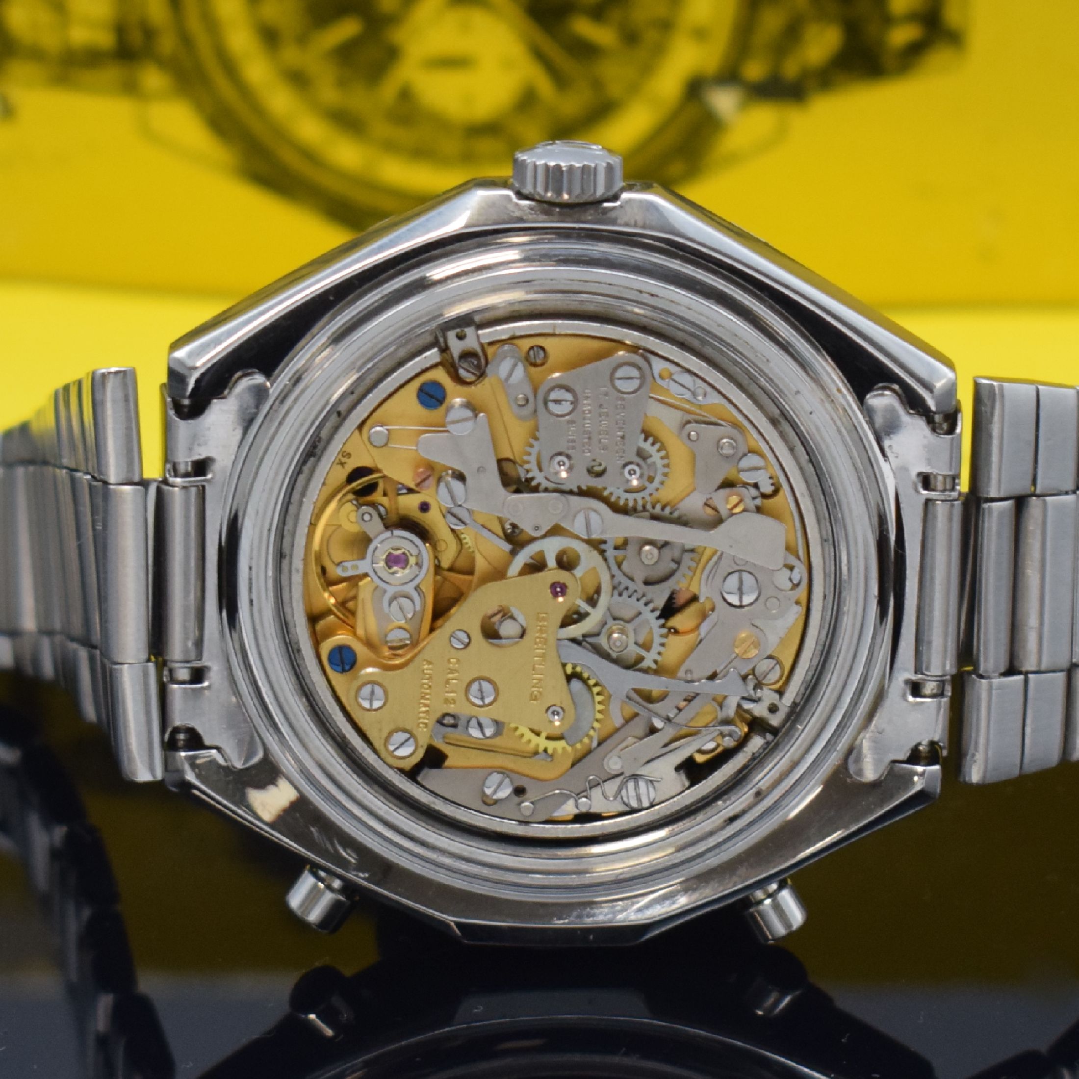 Detail f: BREITLING Armbandchronograph Navitimer Chrono-Matic Referenz 1808, Schweiz um 1972, Edelstahlgeh. inkl. orig. Gliederband m. Faltschl., Boden ...