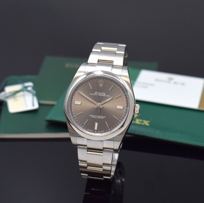 Image ROLEX Oyster Perpetual 39 gents wristwatch reference 114300, self winding, superlative chronometer officially certified, screwed down stainless steel oyster case including oyster bracelet with deployant clasp, gray dial with applied hour-indices, silvered luminous hands, diameter approx. 39 mm, length approx. 21 cm, original papers enclosed, condition 1-2