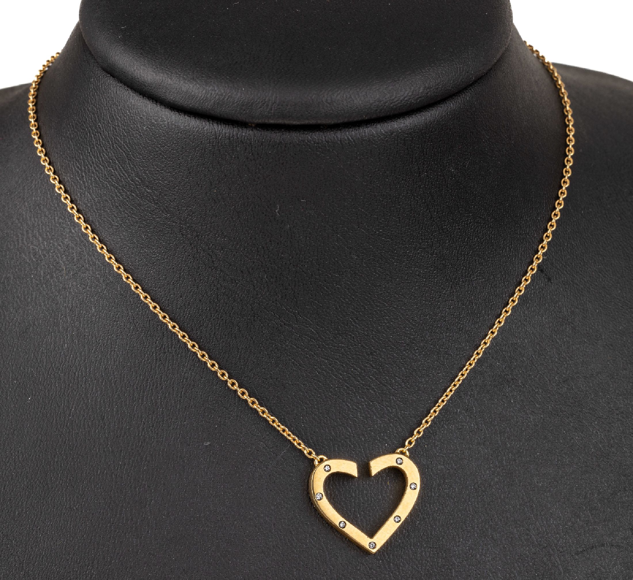 18 kt Gold Brillant-Herzcollier, GG 750/000, 7 Brillanten zus. ca. 0.35 ct Weiß/si, total ca. 6.7 g, L. ca. 40 cm, Karabiner- schließe