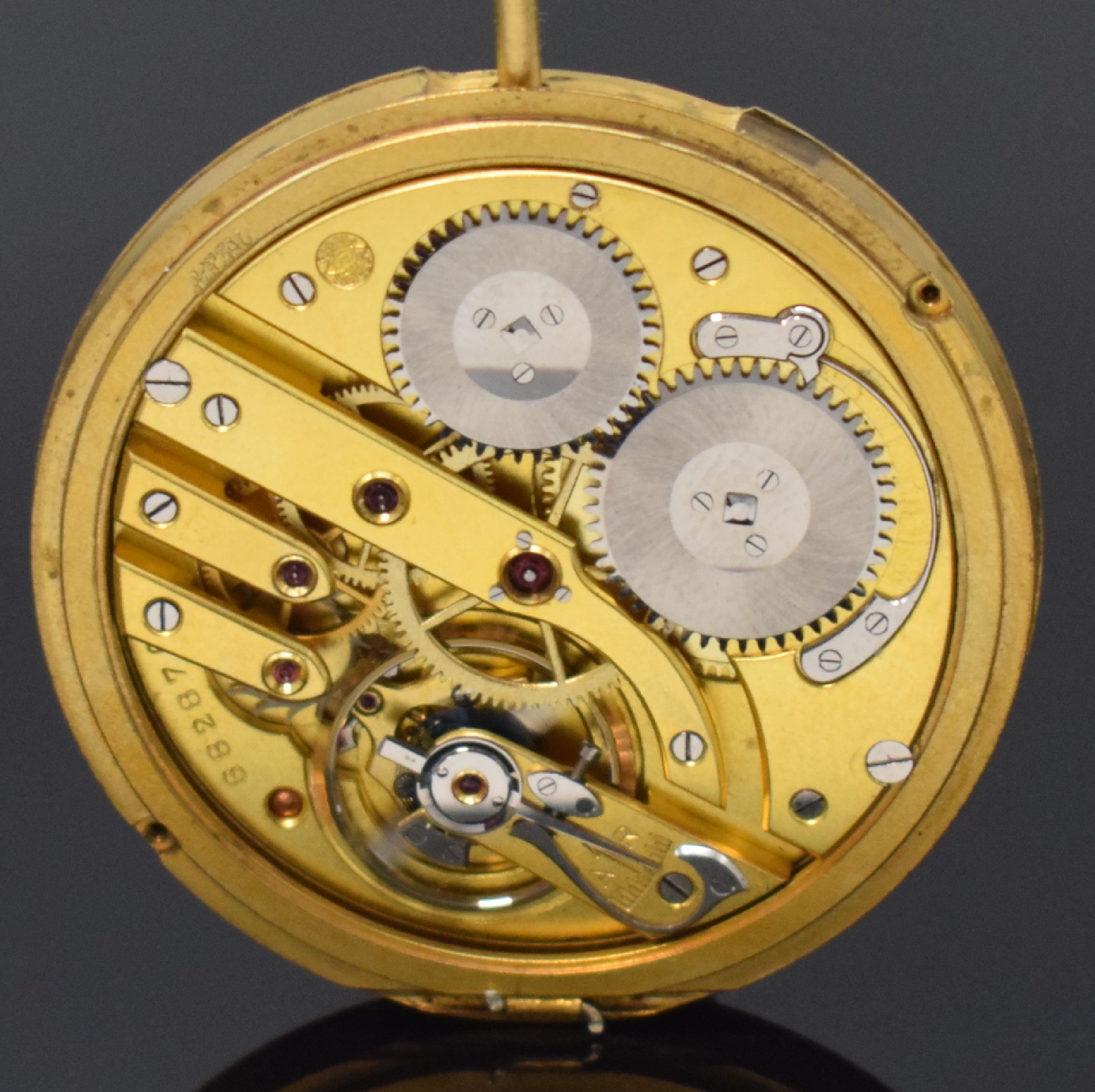 Detail a: IWC Taschenuhrwerk Kaliber 74 erstes Portugieser Werk, Schweiz um 1928, goldfarb. Zifferbl. m. arab. Zahlen und Indizes riss./besch., kl. Sek. b. 6, ...