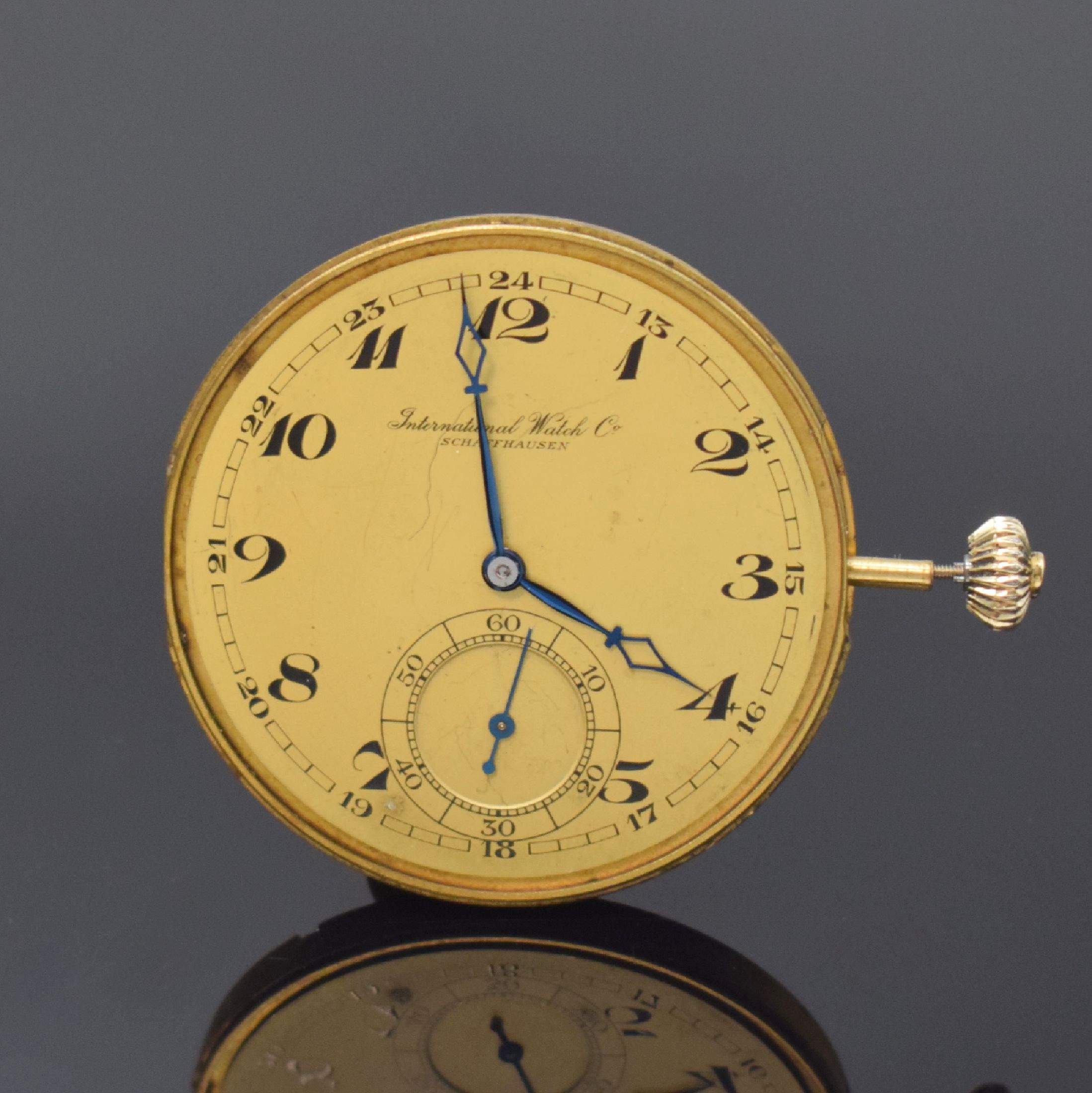 Detail b: IWC Taschenuhrwerk Kaliber 74 erstes Portugieser Werk, Schweiz um 1928, goldfarb. Zifferbl. m. arab. Zahlen und Indizes riss./besch., kl. Sek. b. 6, ...