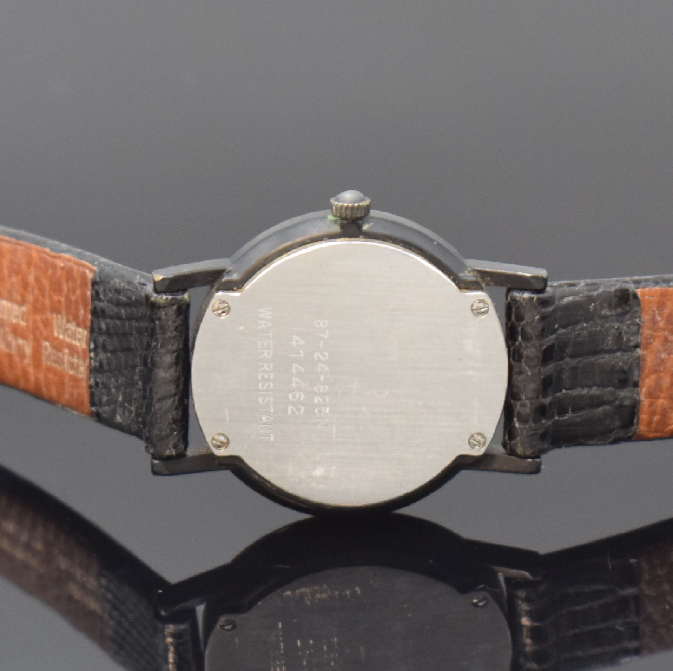 Detail c: MOVADO Museumswatch Armbanduhr Referenz 87-24-825N, Schweiz um 1995, quarz, geschw. Geh., Edelstahlboden 4-fach verschr., neutr. Lederband m. orig. ...