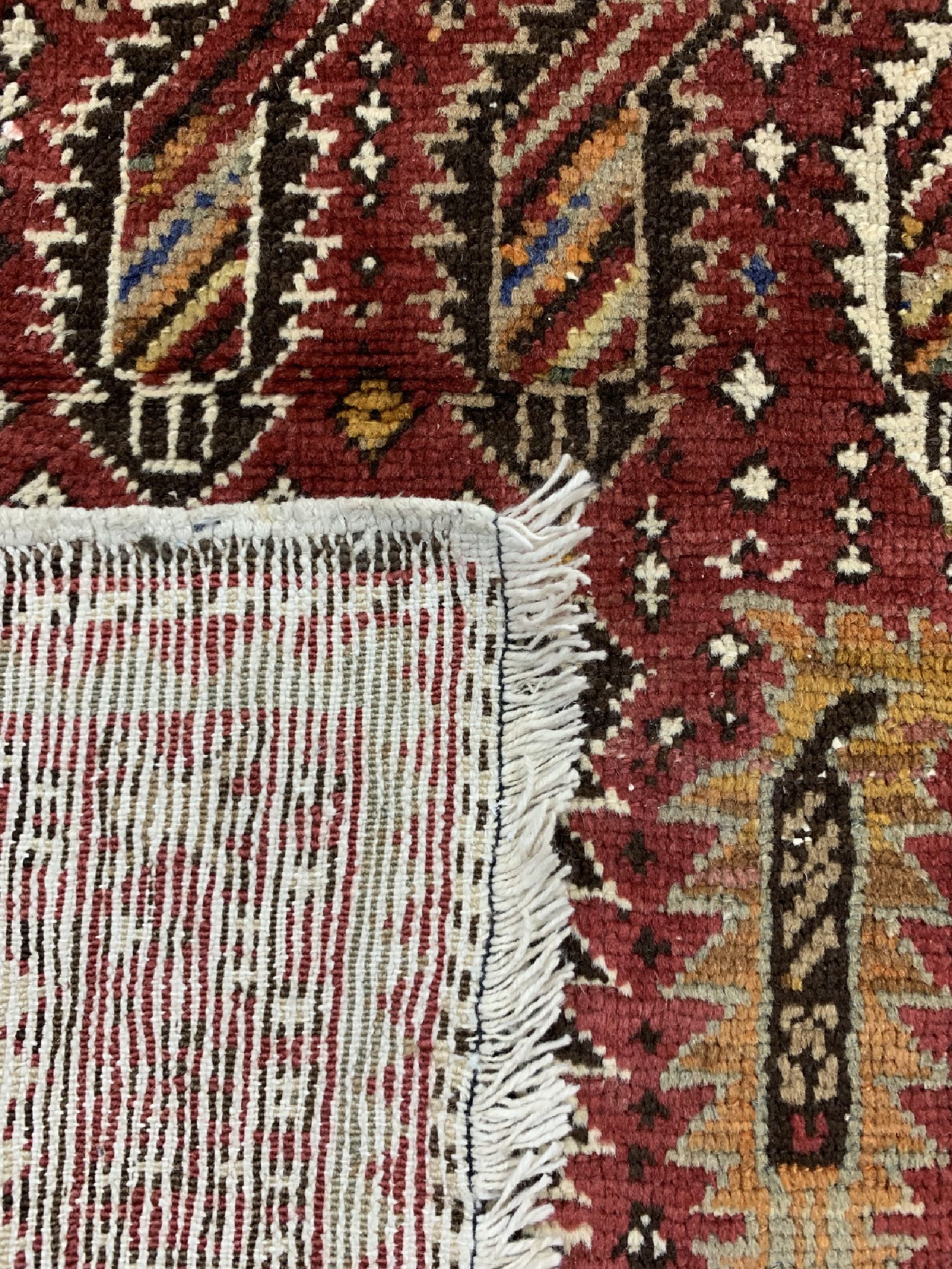 Detail e: Antiker Kazak, Kaukasus, um 1900, Wolle aufBaumwolle, ca. 180 x 100 cm, EHZ: 2-3(Restauriert)
