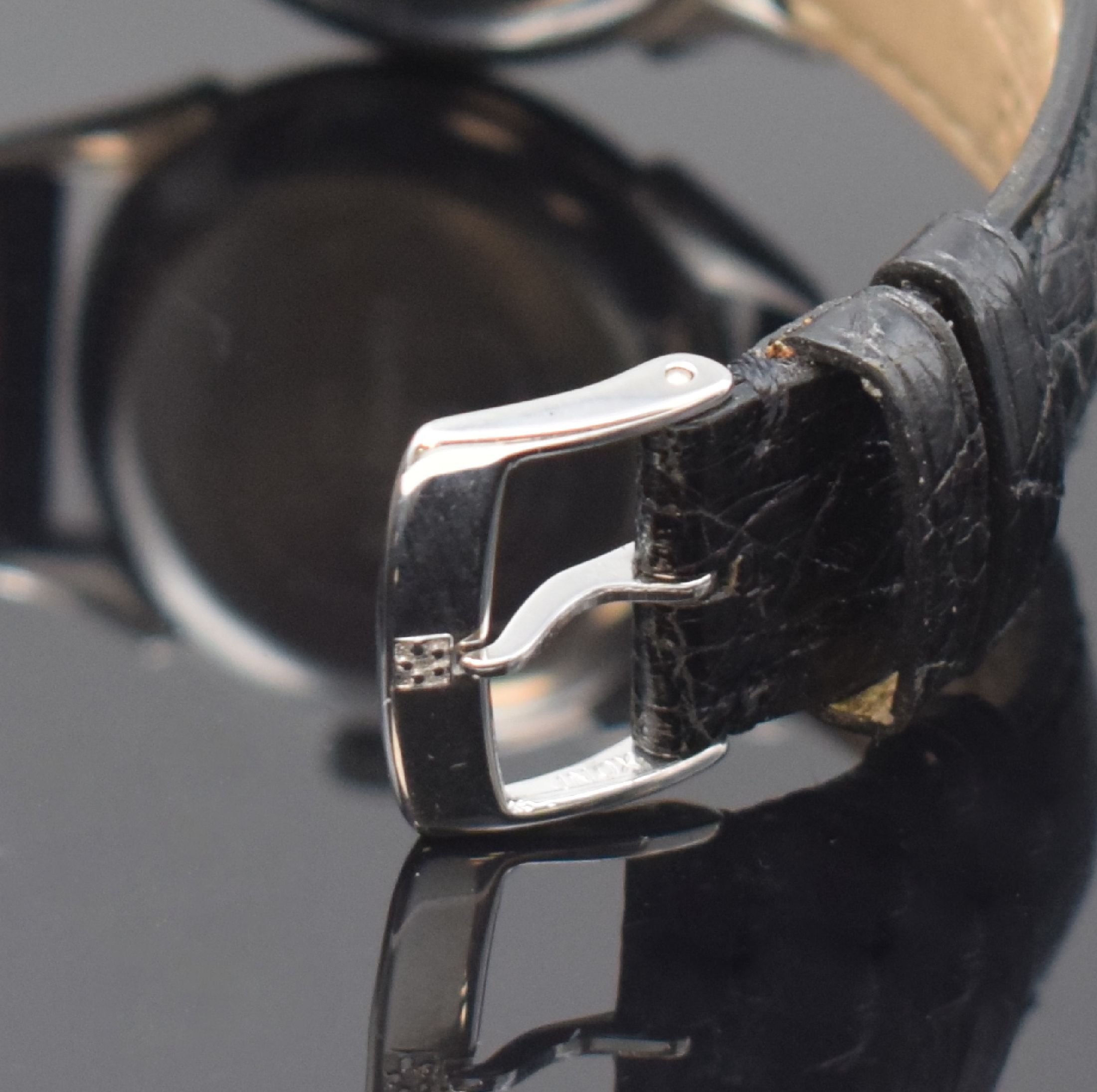 Detail b: ETERNA-MATIC 1948 Herrenarmbanduhr in Stahl, Schweiz um 1995, Automatik, Boden aufgedr., orig. Lederband m. Dornschl., Saphirgl., silb. Zifferbl. m. ...