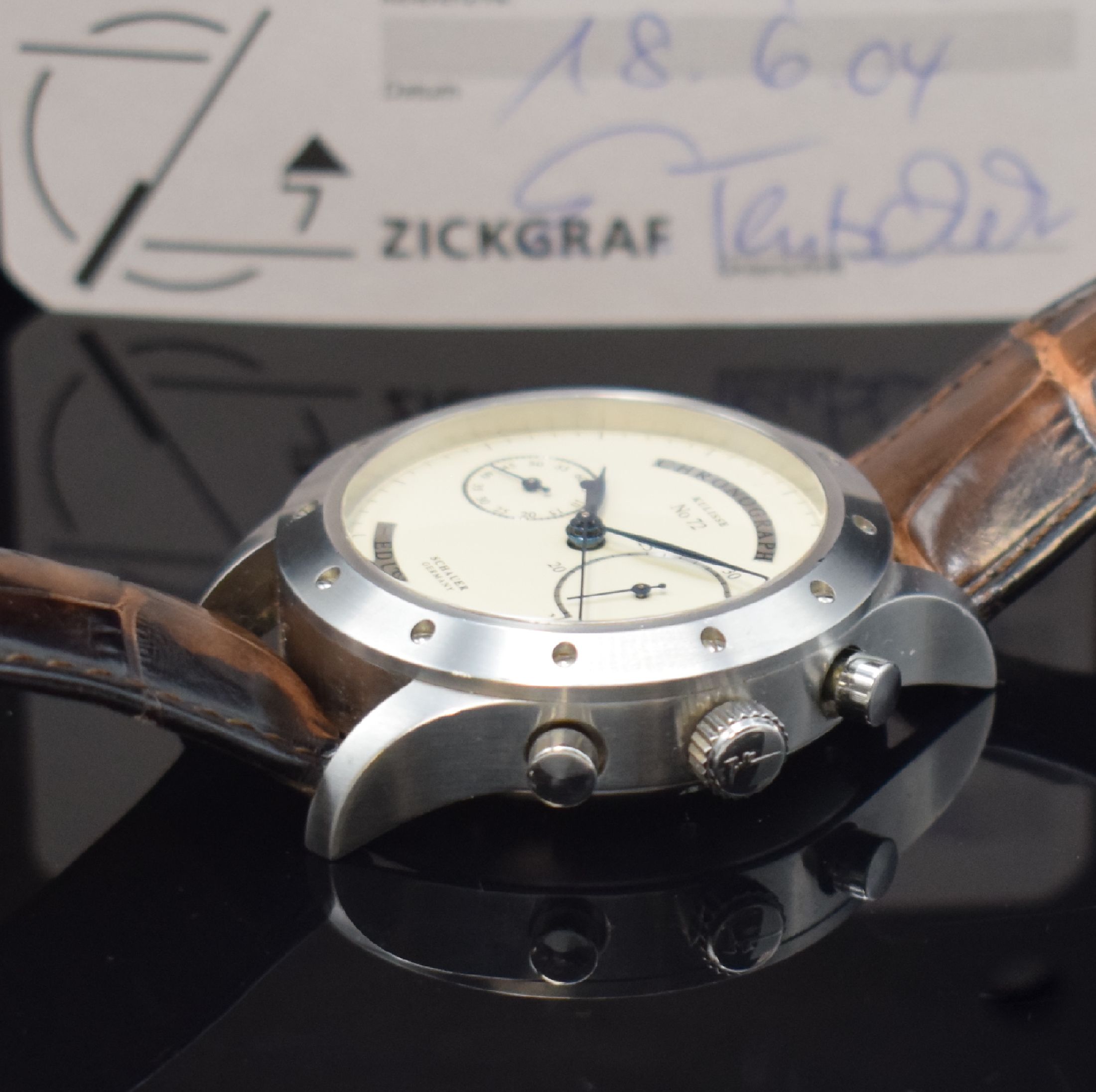 Detail b: SCHAUER Kulisse Edition 12 Armbandchronograph in Stahl, Deutschland verk. lt. beil. Pap. 06/2004, Automatik, beids. verg. Geh., Boden verschr., orig. ...