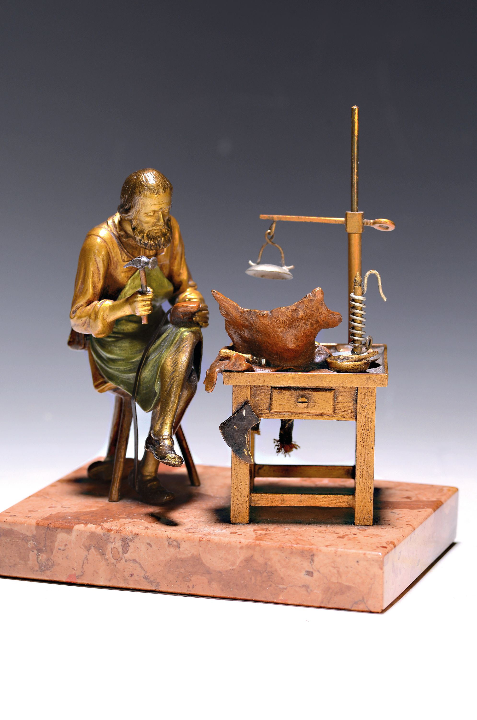 Bronzefigur, wohl Wien, um 1900, Schuhmacher in seiner Werkstatt, detailreiche Ausführung, bez.: Gesetzl.Geschützt, auf Marmorplinthe, ca. ...