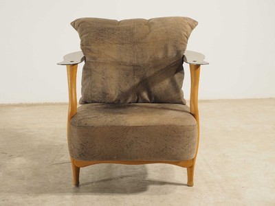 Image 26713873 - Design armchair by Kurt Beier, model: Fantasy Island, beech wood frame with steel backrest, brown leather covers with some black marbling, including 4 loose pillows, signs of age and use, approx. 67x80x77 cm