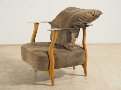 26713873a - Design armchair by Kurt Beier, model: Fantasy Island, beech wood frame with steel backrest, brown leather covers with some black marbling, including 4 loose pillows, signs of age and use, approx. 67x80x77 cm