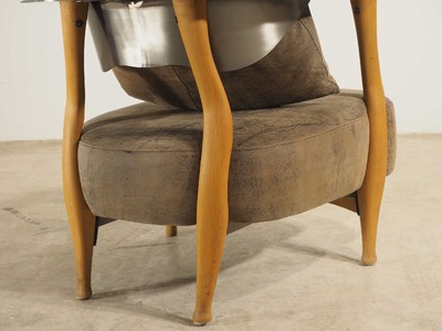 26713873e - Design armchair by Kurt Beier, model: Fantasy Island, beech wood frame with steel backrest, brown leather covers with some black marbling, including 4 loose pillows, signs of age and use, approx. 67x80x77 cm
