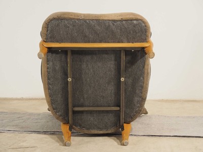 26713873f - Design armchair by Kurt Beier, model: Fantasy Island, beech wood frame with steel backrest, brown leather covers with some black marbling, including 4 loose pillows, signs of age and use, approx. 67x80x77 cm