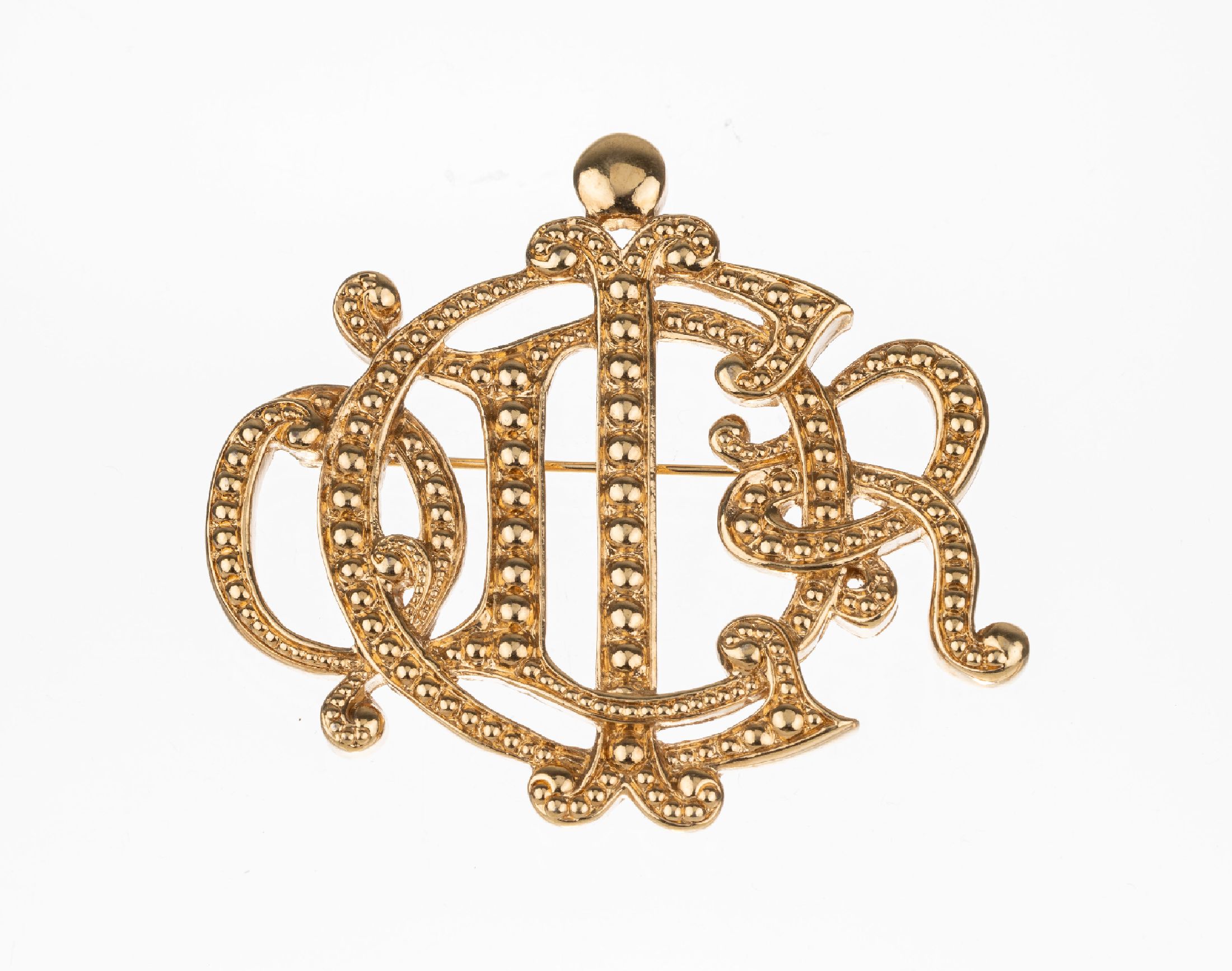 CHRISTIAN DIOR Brosche, 1980er Jahre Metall verg., ligierter Schriftzug, mit erhabenem Dekor, Anlehnung an eine Gürtelschnalle, sign., ca. 5.5 x ...