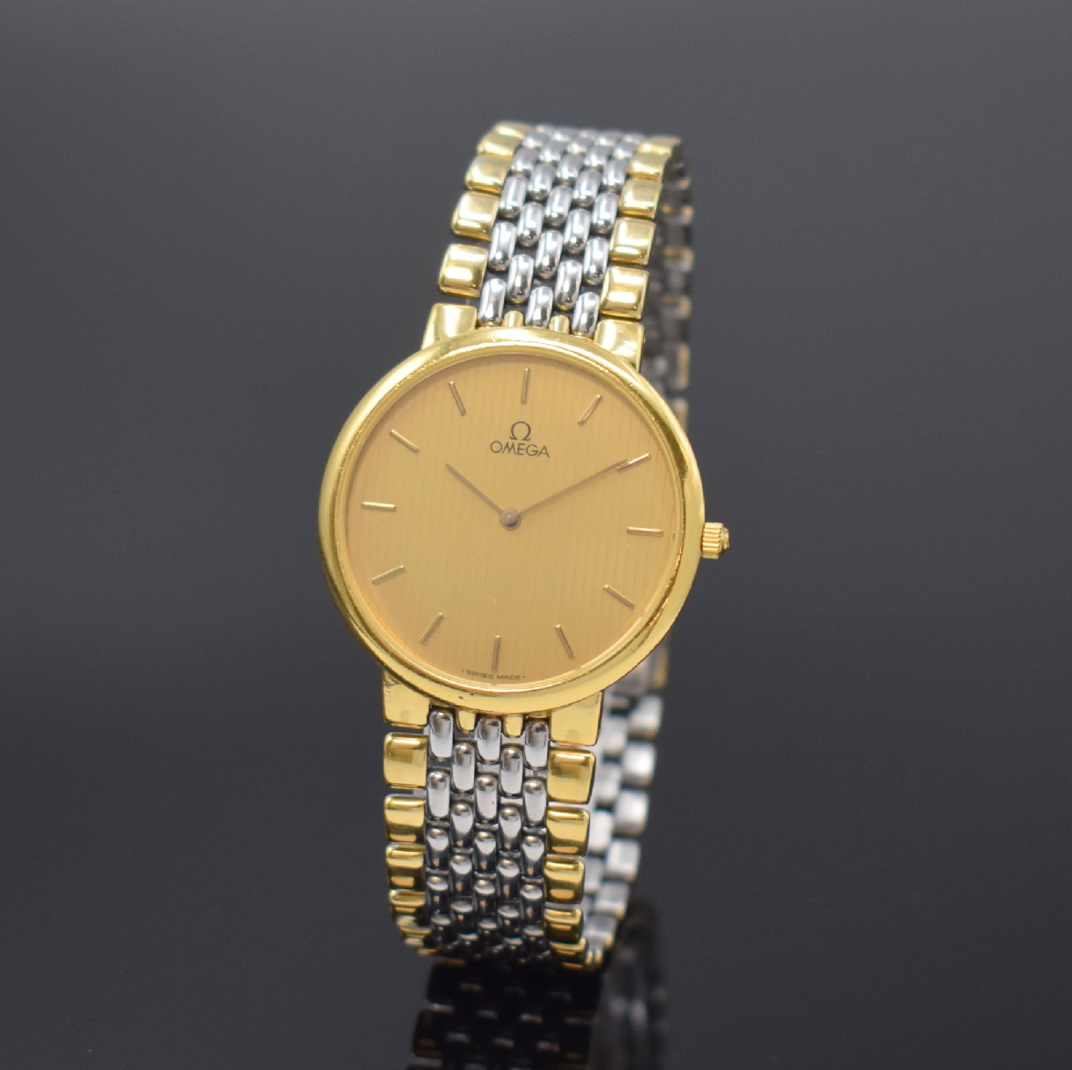 OMEGA De Ville Armbanduhr Referenz 395 0875, Schweiz um 1990, quarz, Edelstahl und Gold komb., Gliederband m. Faltschl., Stahlboden aufgedr., gold. ...
