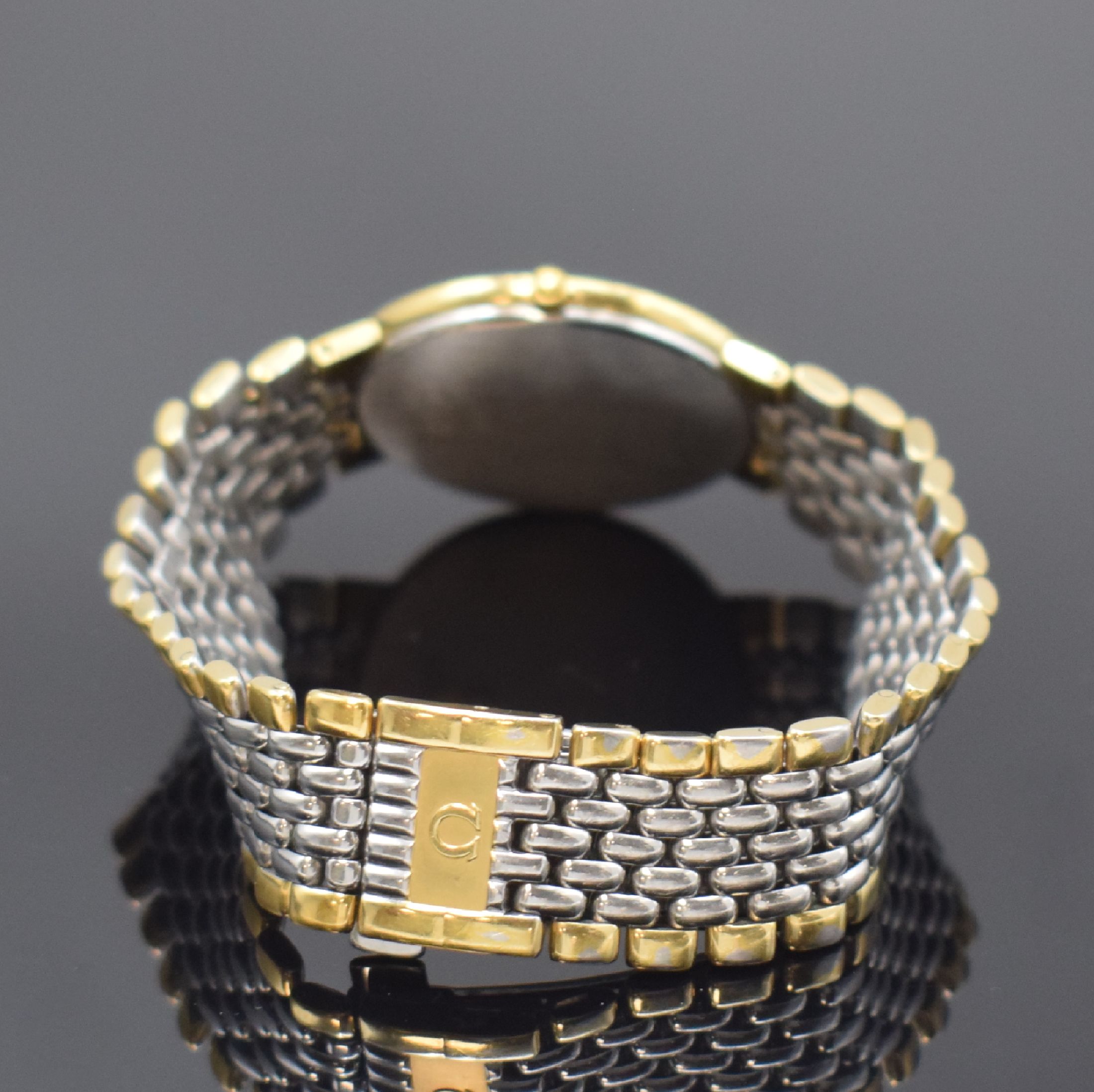 Detail b: OMEGA De Ville Armbanduhr Referenz 395 0875, Schweiz um 1990, quarz, Edelstahl und Gold komb., Gliederband m. Faltschl., Stahlboden aufgedr., gold. ...