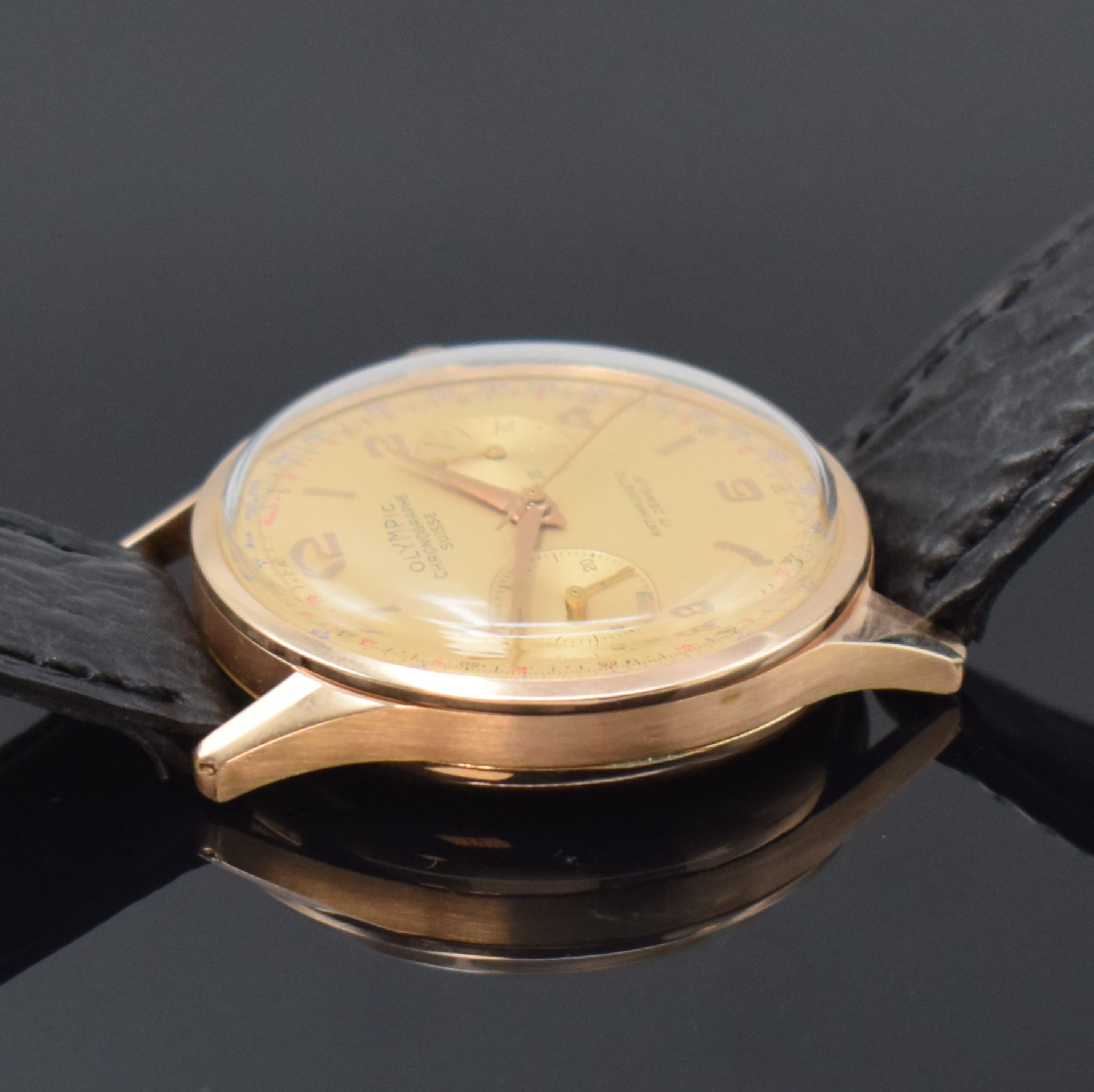 Detail c: OLYMPIC / CHRONOGRAPHE SUISSE Herrenchronograph in RG 750/000, Schweiz um 1960, Handaufzug, Geh. dell., Boden aufgedr., goldfarb. Zifferbl. m. gold. ...