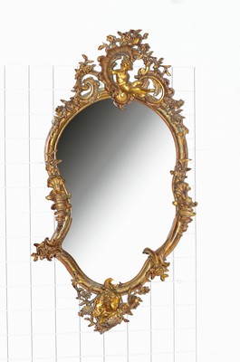 Image 26714295 - Rococo mirror, end 19th c., wood, stucco elements, asymmetrical shape, shell work, crowning cupid, rest. and damn. , 124x66 cm