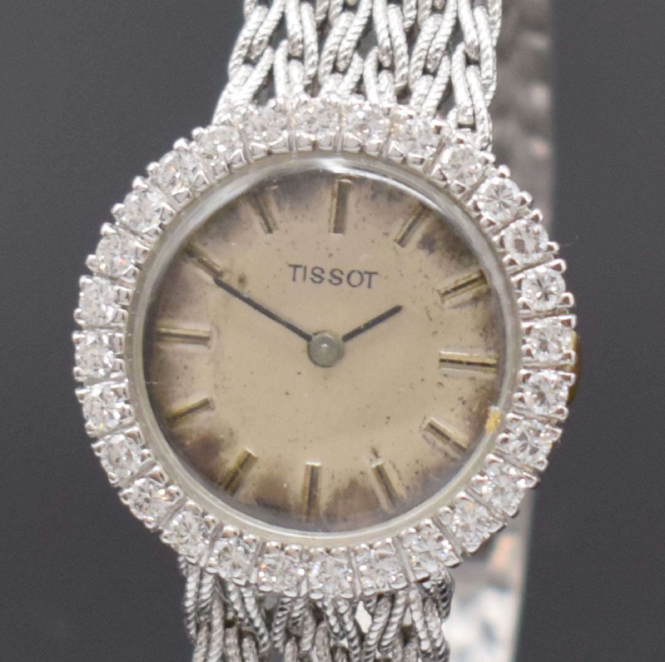 Detail a: TISSOT Damenarmbanduhr in WG 750/000 mit Diamanten, Schweiz um 1965, Handaufzug, Lünette aufw. m. Diamanten bes. (ca. 0,8ct), silb. Zifferbl. stark ...