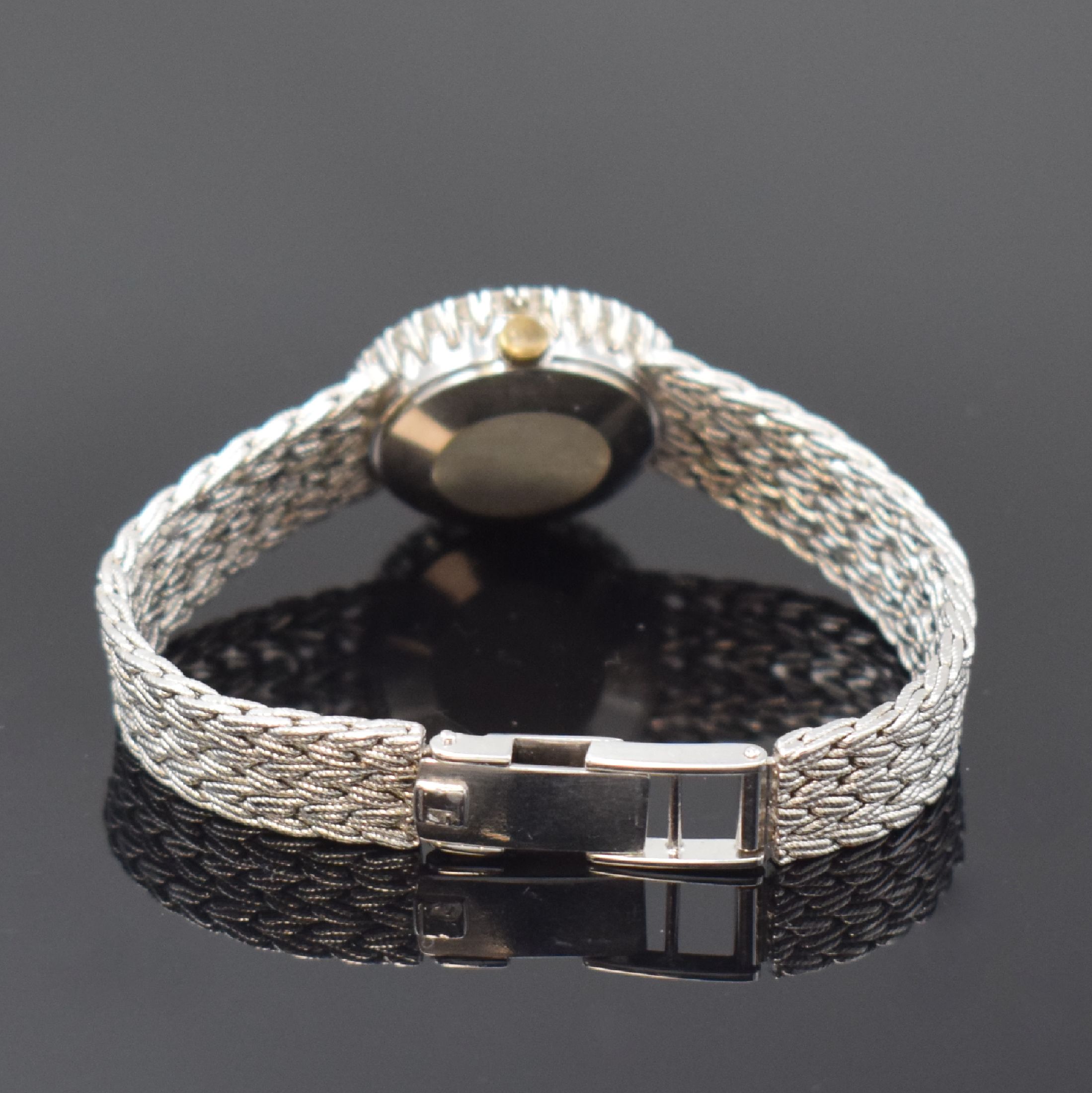 Detail b: TISSOT Damenarmbanduhr in WG 750/000 mit Diamanten, Schweiz um 1965, Handaufzug, Lünette aufw. m. Diamanten bes. (ca. 0,8ct), silb. Zifferbl. stark ...