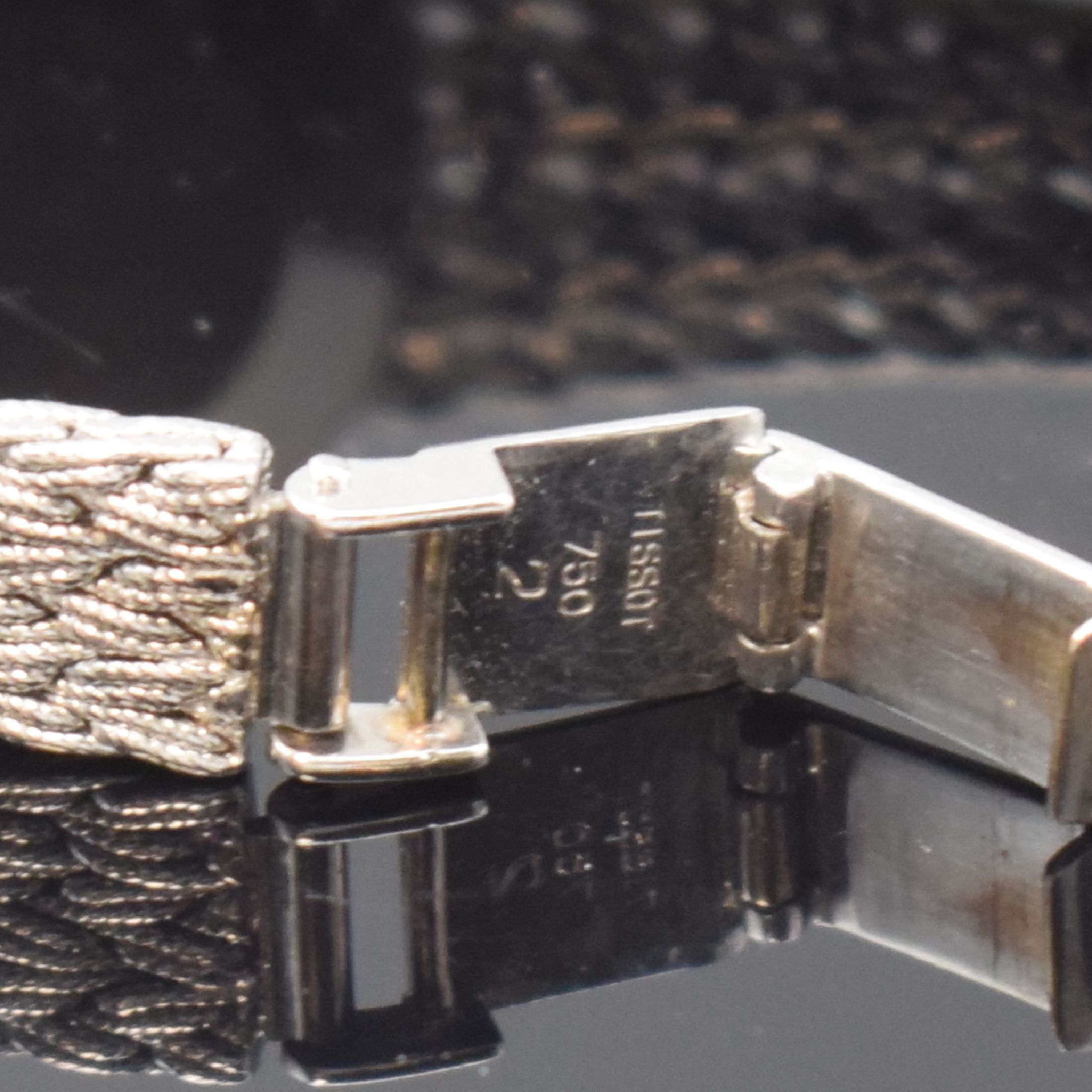 Detail c: TISSOT Damenarmbanduhr in WG 750/000 mit Diamanten, Schweiz um 1965, Handaufzug, Lünette aufw. m. Diamanten bes. (ca. 0,8ct), silb. Zifferbl. stark ...