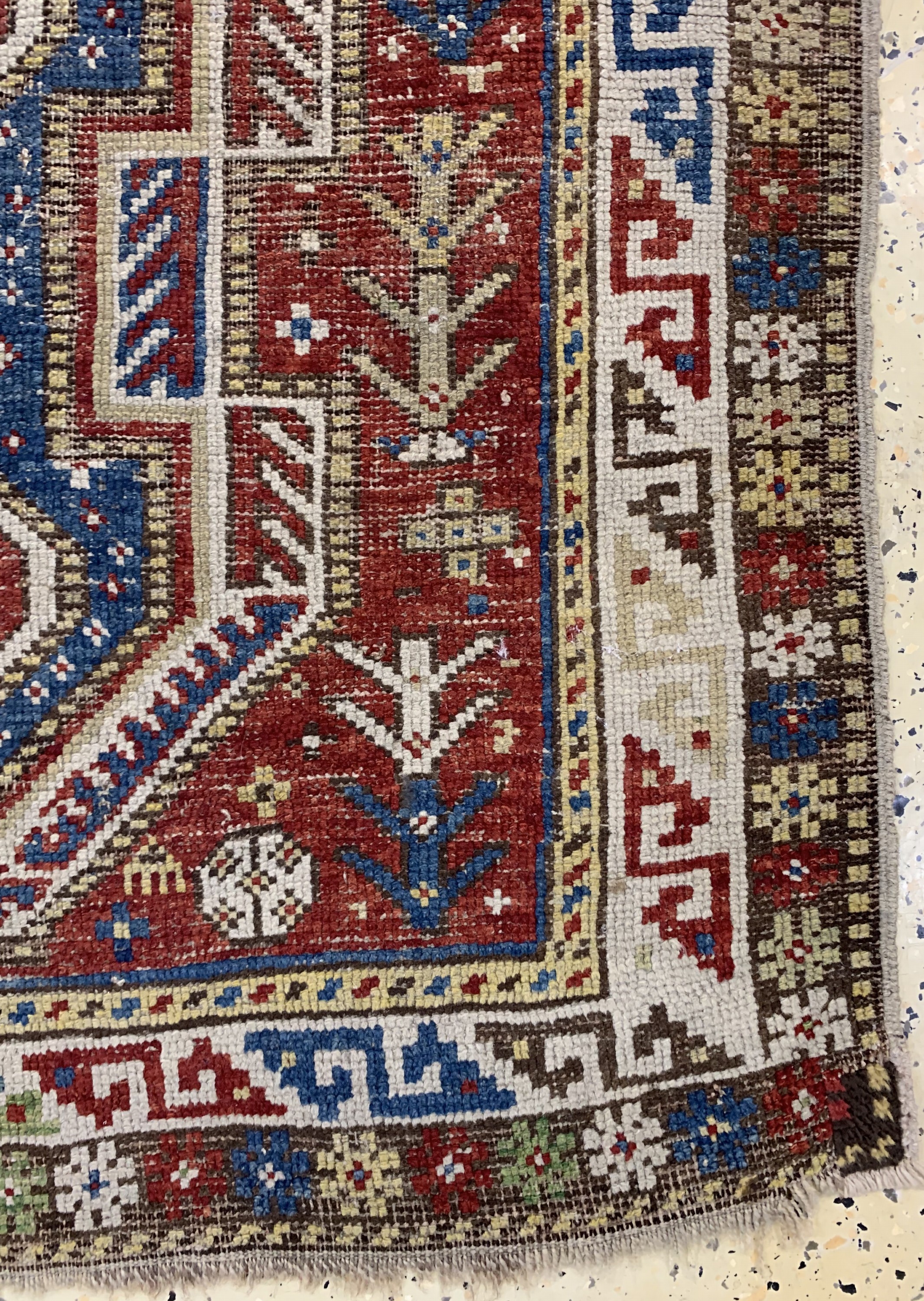 Detail a: Antiker"Schild-Kazak", Kaukasus, 19.Jhd, Wolle auf Wolle, ca. 140 x 103 cm, EHZ: 4