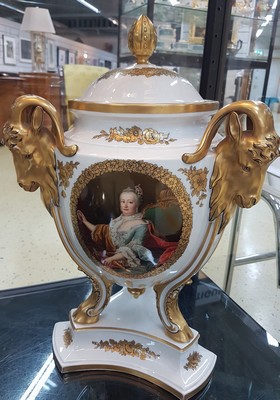 26714568a - Large portrait lid vase, Rosenthal, around 1910/20, porcelain, 3-fold extended stand, three curved goat legs ending in goat heads, rich gold decoration and floral gold painting, picture cartouche on the front side with a portrait of Maria Theresa of Austria after the painting by Martin van Meytens (around 1750), floor mark, rubbed, h. 51 cm