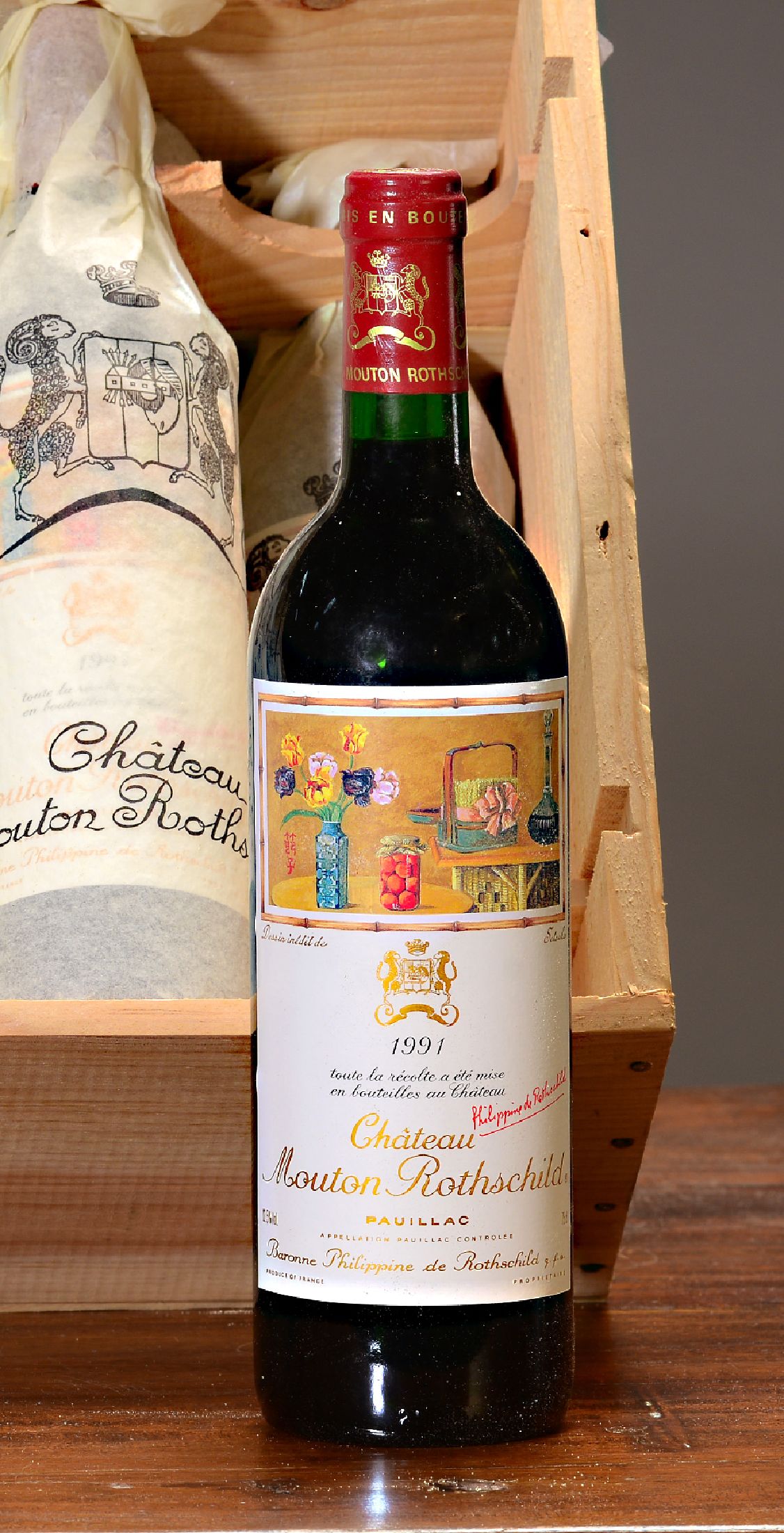 Detail a: 12 Flaschen 1991 Chateau Mouton Rothschild, Paulliac, premier grand cru classé. je 75cl, orig. verkorkt und unverkostet, in orig. Holzkiste, einmal ...