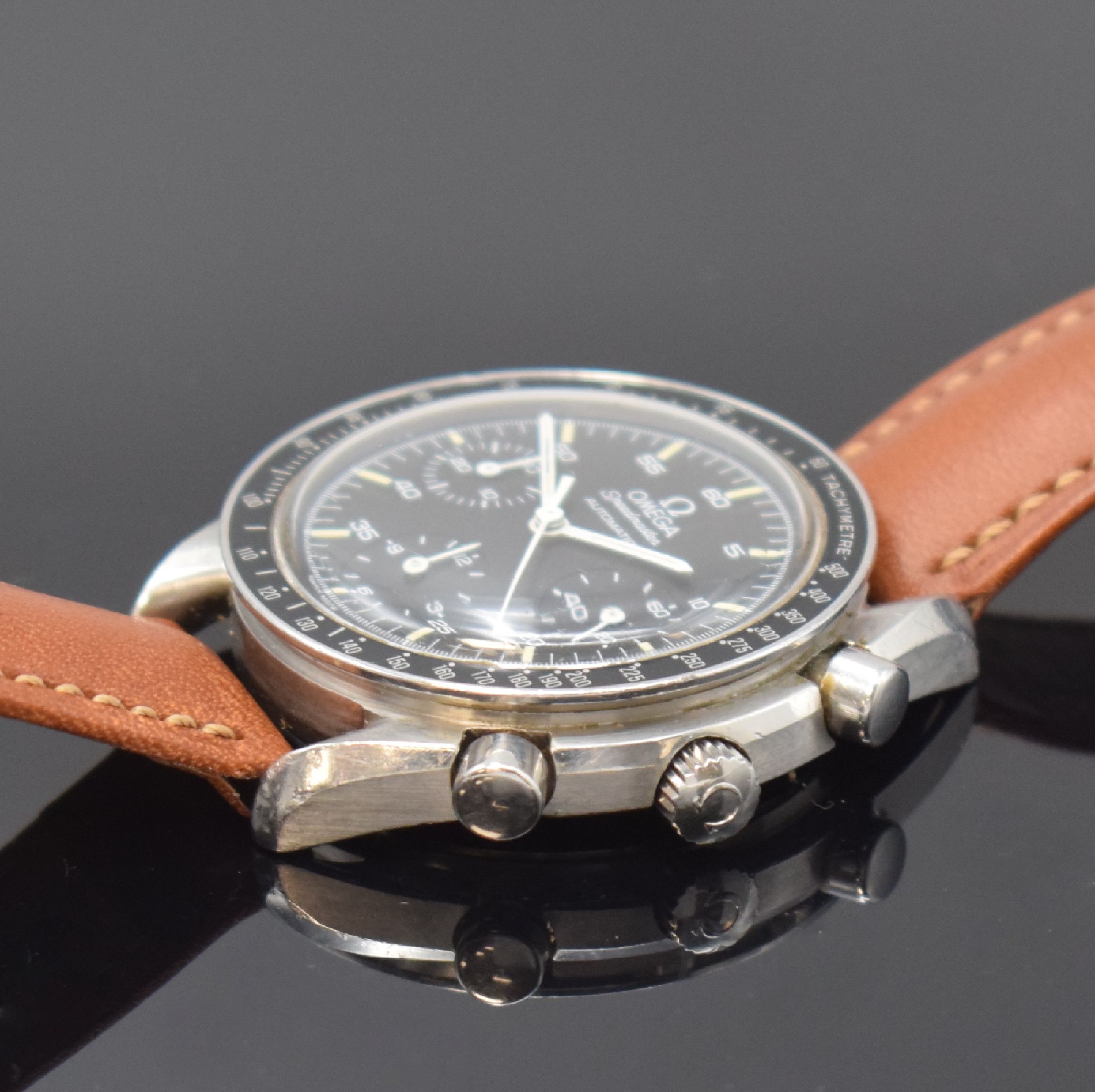 Detail b: OMEGA Armbandchronograph Speedmaster Reduced Referenz 175.0032, Automatik, Schweiz um 1990, Edelstahlgeh., Boden aufgedr., Lünette m. ...