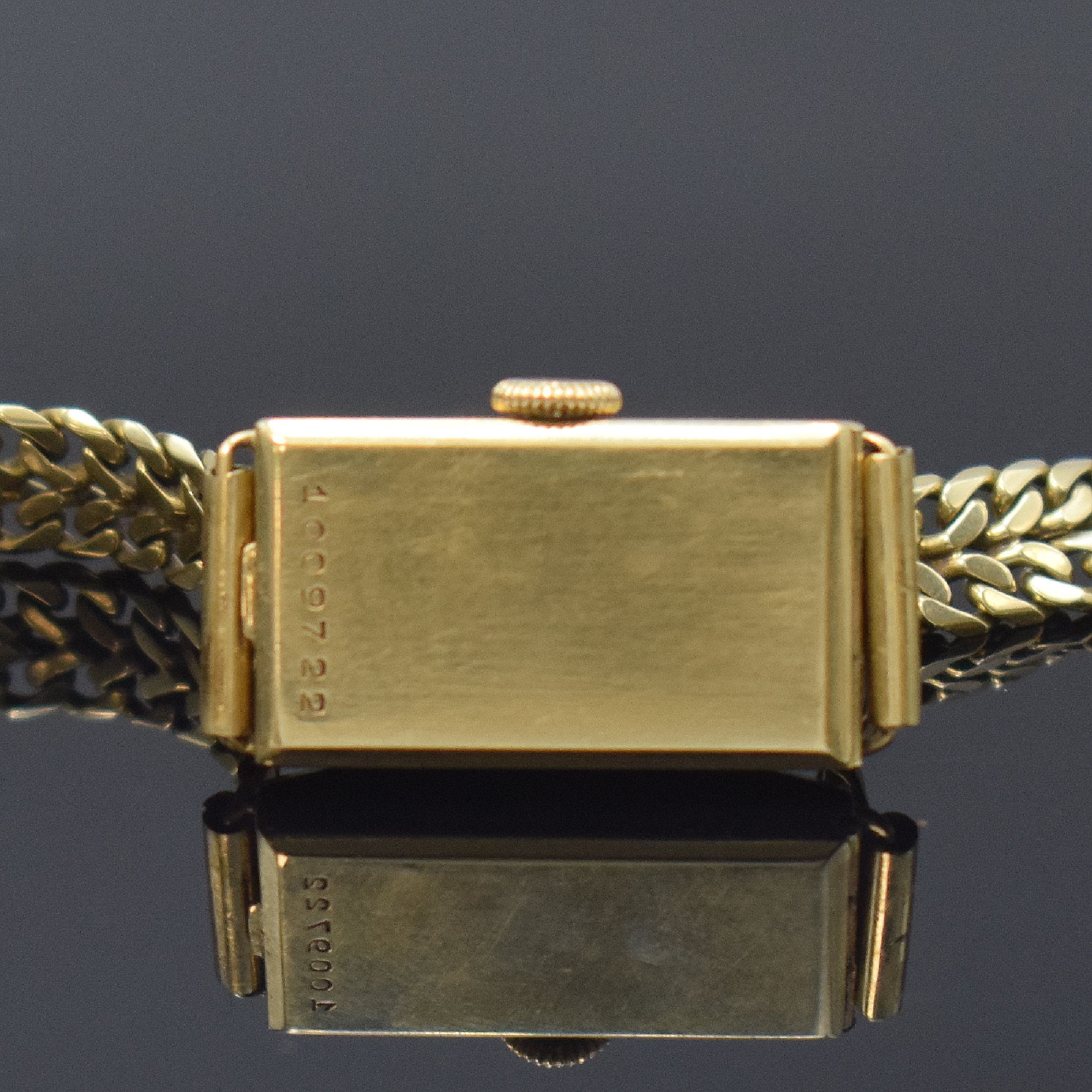 Detail d: IWC rechteckige Damenarmbanduhr am späteren Goldband in GG 585/000, Schweiz um 1930, Handaufzug, Scharniergeh. m. Drahtanstößen, gold. Zifferbl. ...