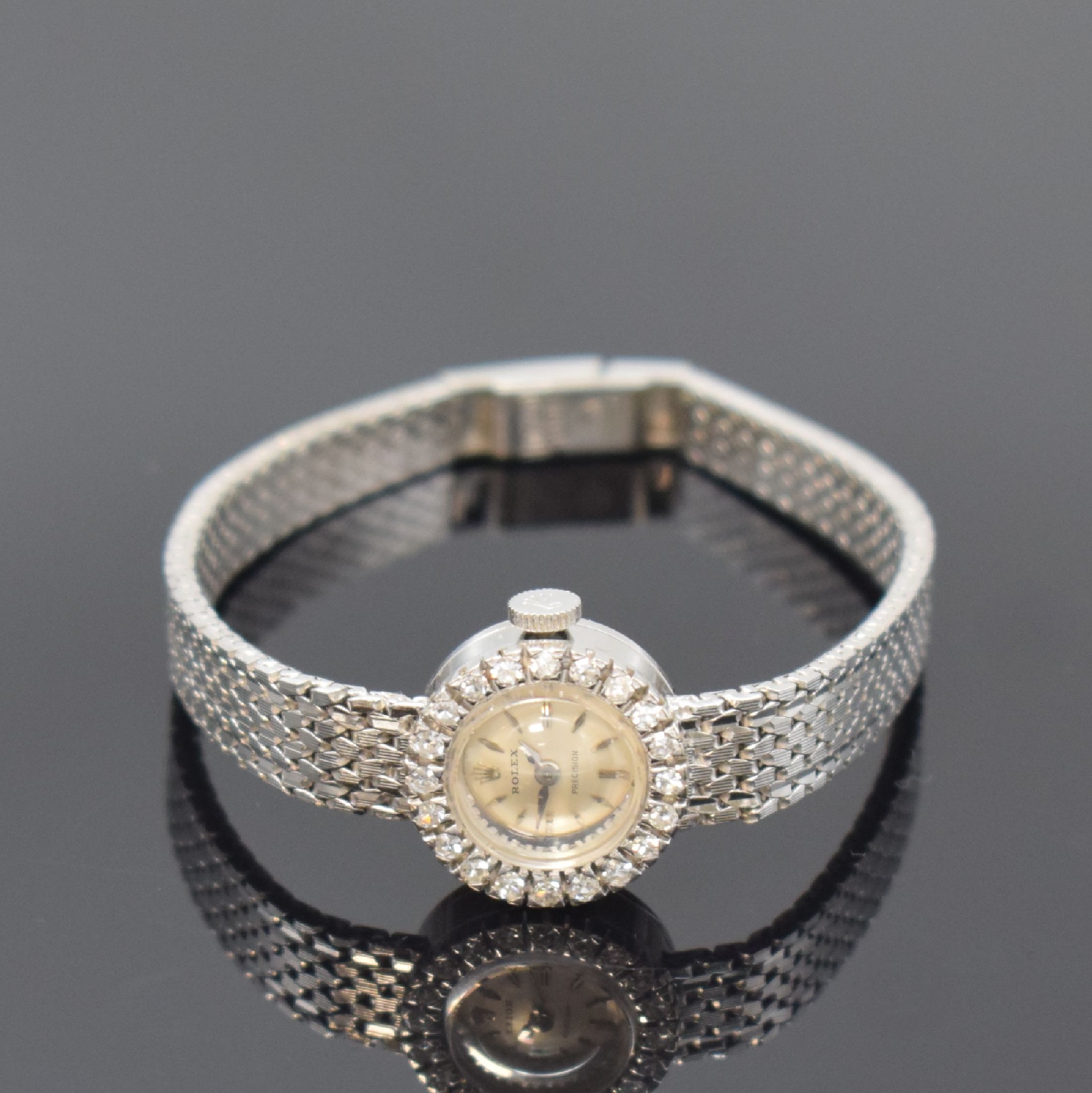 ROLEX Precision Damenarmbanduhr in WG 750/000 mit Diamanten, Schweiz 1960er Jahre, Handaufzug, Lünette aufw. m. Diamanten besetzt, silb. Zifferbl. ...