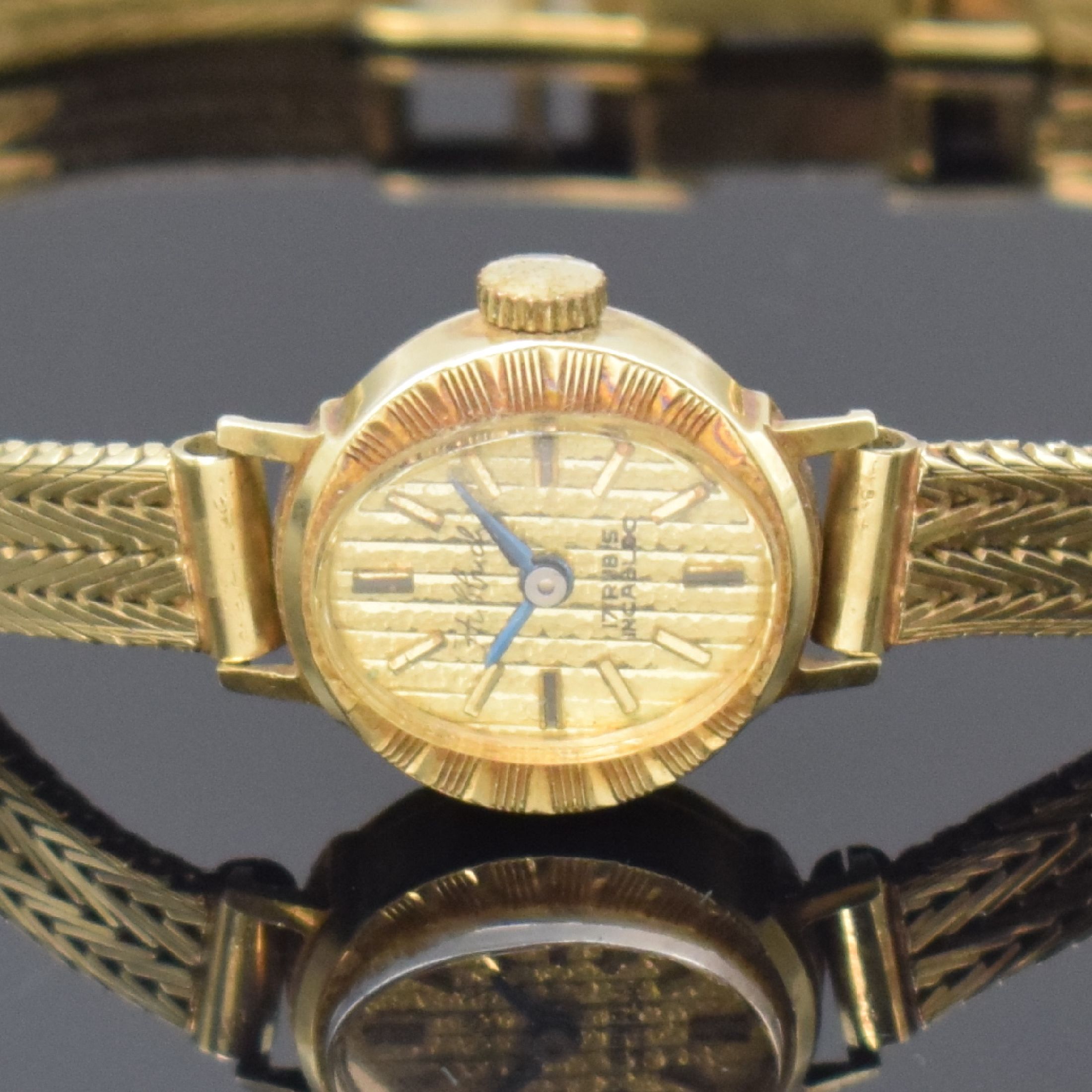 Detail a: HUBBUCH Damenarmbanduhr in GG 585/000, Deutschland/Schweiz um 1965, Handaufzug, 2- teil. Geh. m. aufgedr. Boden, gold. Zifferbl., gold. Indizes, ...