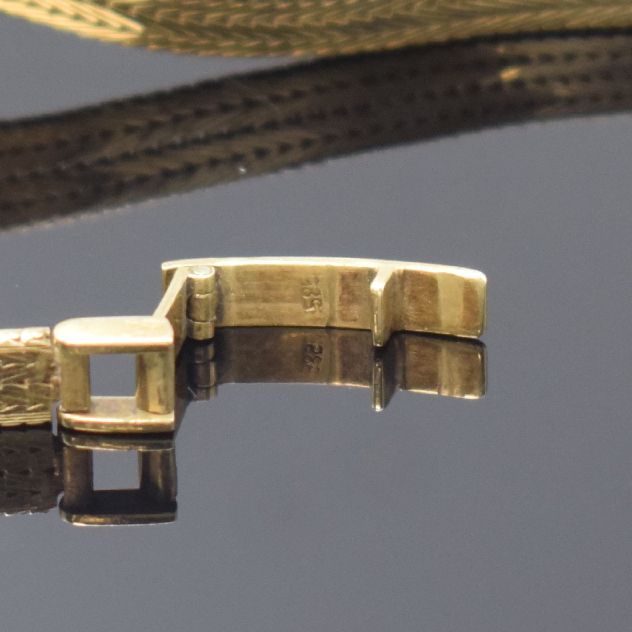 Detail b: HUBBUCH Damenarmbanduhr in GG 585/000, Deutschland/Schweiz um 1965, Handaufzug, 2- teil. Geh. m. aufgedr. Boden, gold. Zifferbl., gold. Indizes, ...