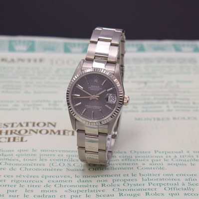 Image Rolex Datejust 31 mm 18k white gold ladies wristwatch reference 68279, self winding, screwed down oyster case with fluted bezel, sapphire crystal, rare oyster bracelet reference 7205, gray, striped dial, silvered indices and hands, date under magnifying glass at 3, rhodium plated movement calibre 2135, diameter approx. 31 mm, length approx. 19 cm, condition 2
