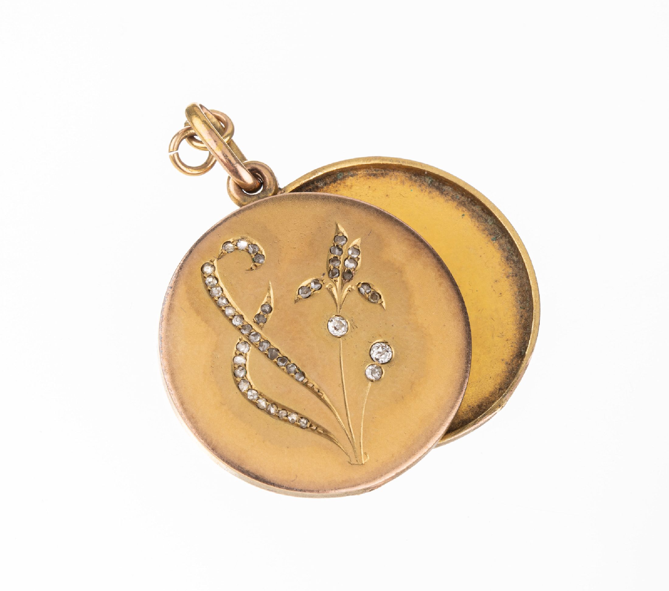 Detail a: 18 kt Gold Diamant-Medaillonanhänger, GG 750/000, reiner Jugendstil um 1900, runde Form, florale Gravur mit Altschliff-Diamanten zus. ca. 0.20 ct ...