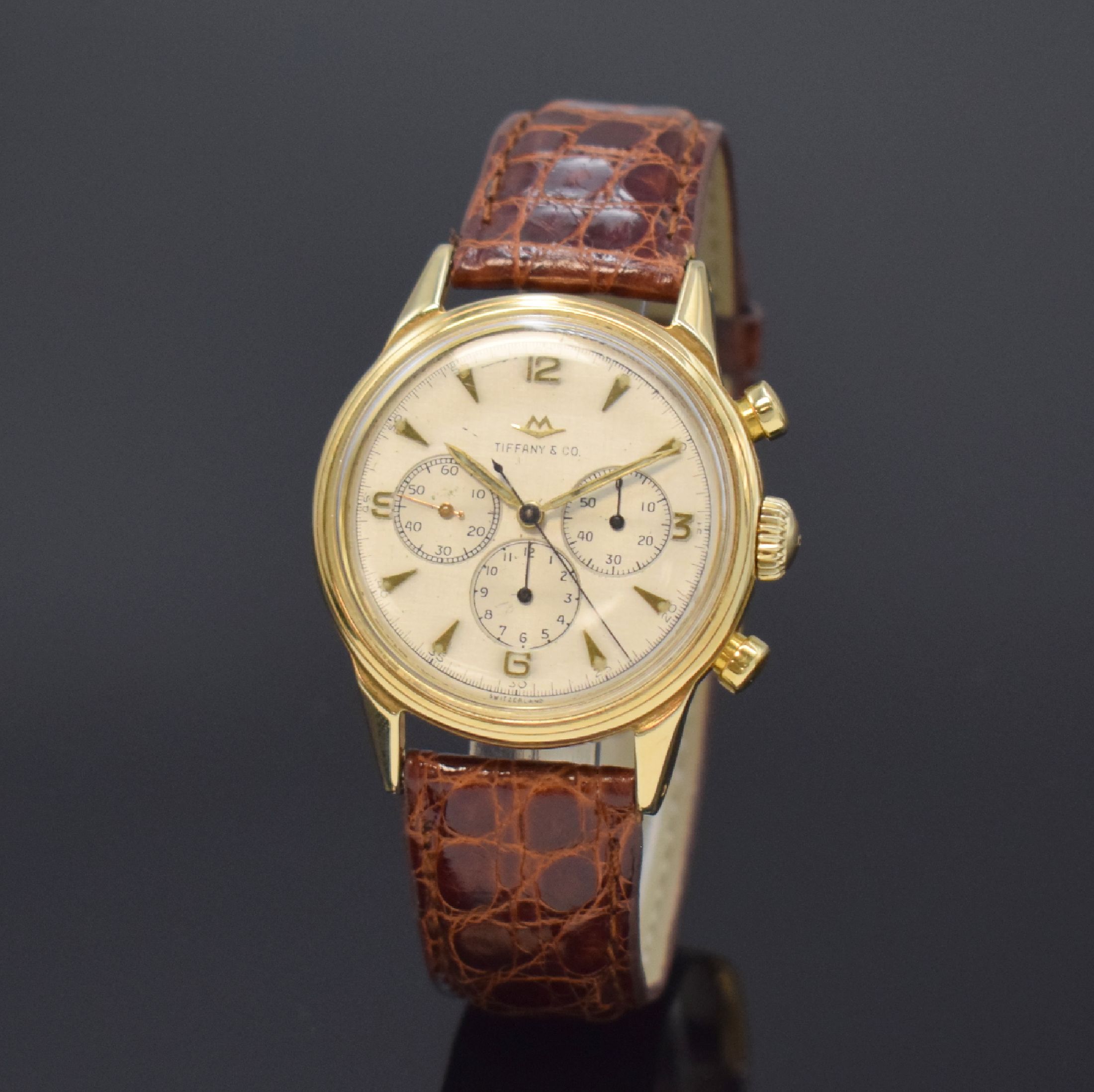 MOVADO / TIFFANY & Co Schaltradchronograph Kaliber 95M in GG 585/000, Schweiz um 1955, Handaufzug, verschr. FB-Geh., Werk unter Staubschutz, orig. ...