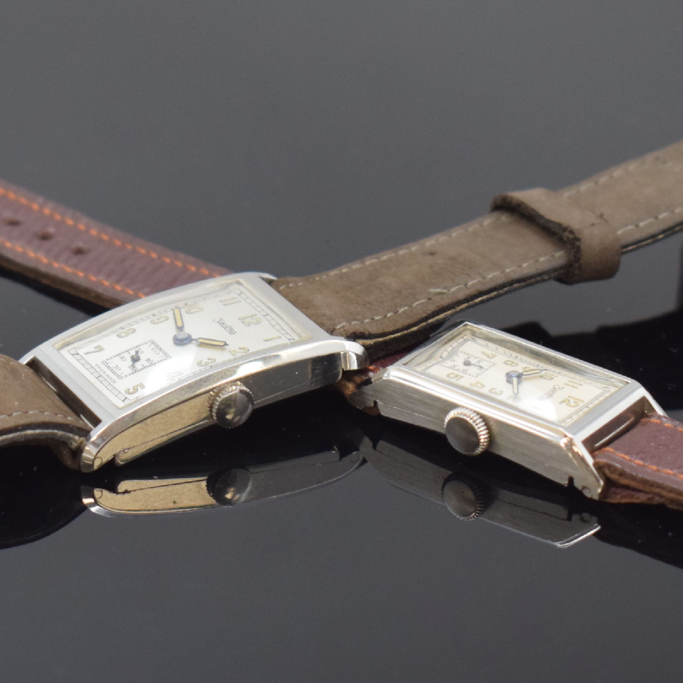 Detail d: ZENTRA 2 nahezu neuwertige Armbanduhren in Stahl mit Verkaufsschild und original Band, Schweiz um 1940, Handaufzug, aufgedr. Böden, silb. ...
