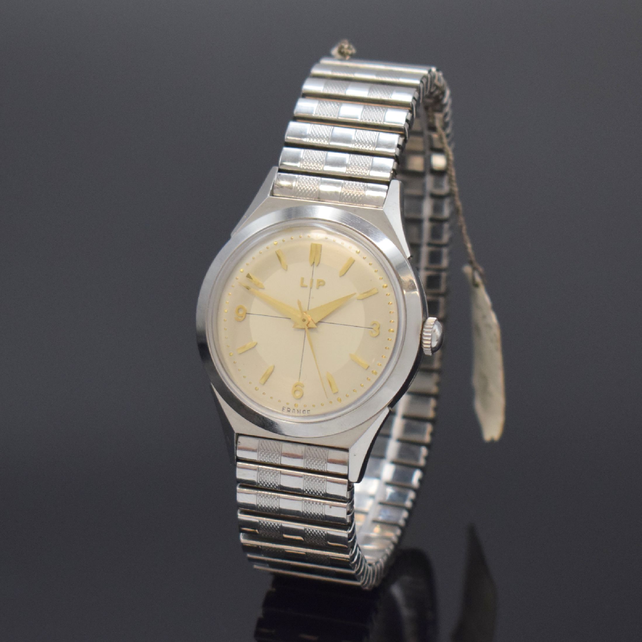 LIP nahezu neuwertige Armbanduhr in Stahl, Frankreich um 1950, Handaufzug, verschr. Geh., rücks. gekröntes Wappen v. Besancon, Stahl-Flexband sowie ...