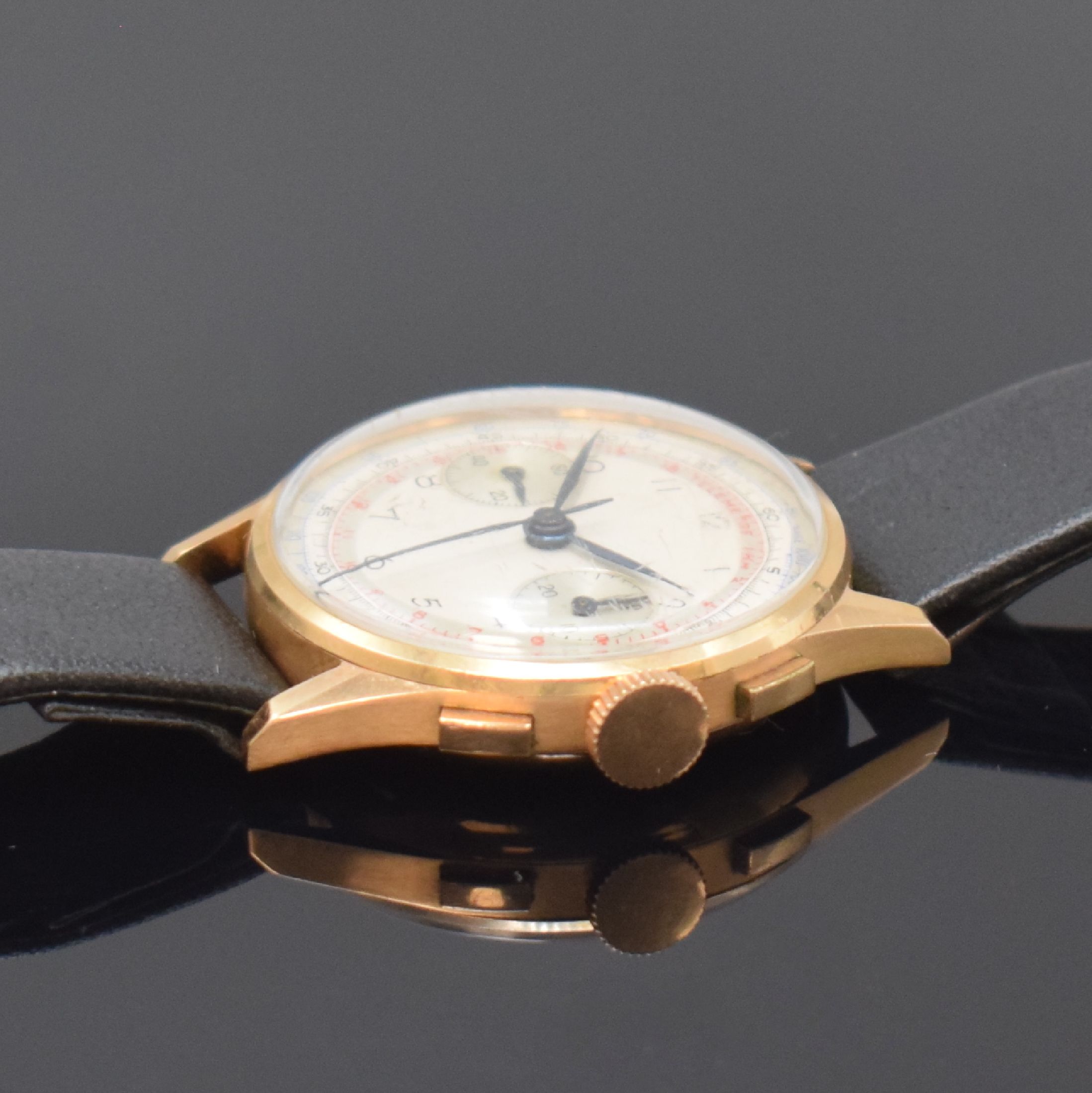 Detail b: LANDERON Armbandchronograph in RG 750/000, Schweiz um 1955, Handaufzug, Boden u. Glasrand aufgedr., Geh. dell., silb. Zifferbl. m. arab. Zahlen, ...