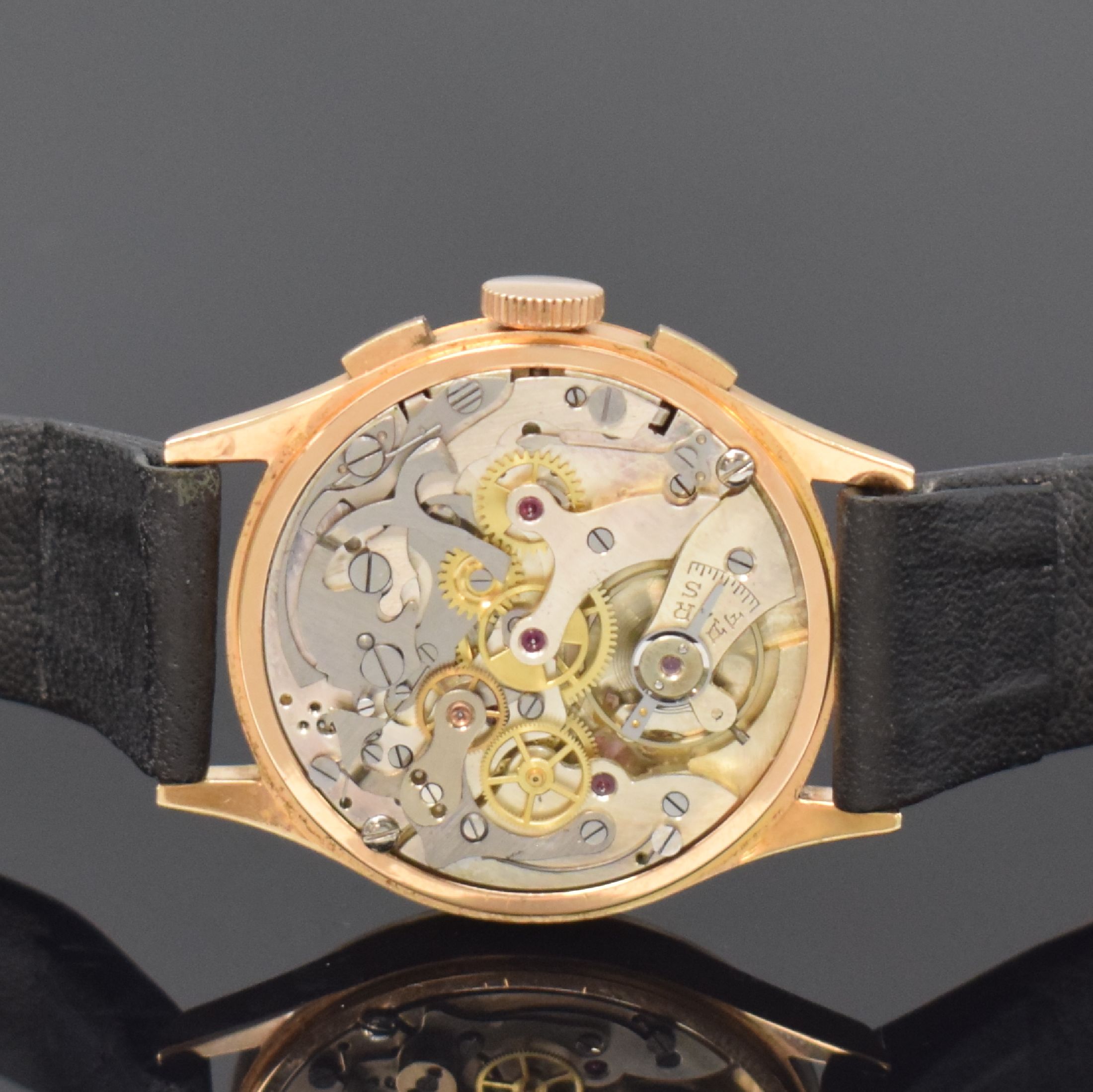Detail e: LANDERON Armbandchronograph in RG 750/000, Schweiz um 1955, Handaufzug, Boden u. Glasrand aufgedr., Geh. dell., silb. Zifferbl. m. arab. Zahlen, ...