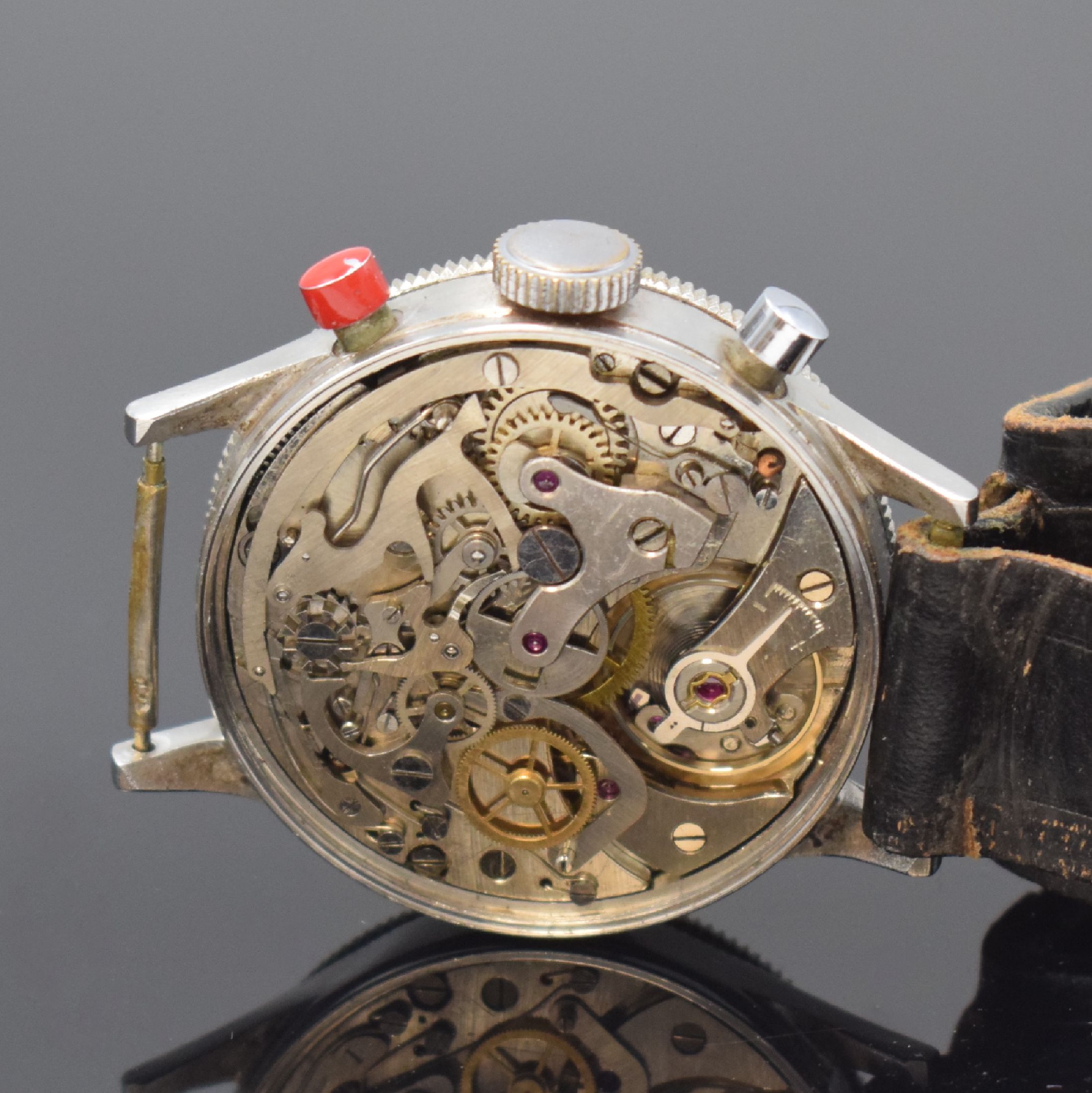 Detail d: HANHART Flyback Fliegerchronograph in Stahl,Deutschland um 1960, Handaufzug, geriffelte Drehlünette, Boden geschr., schwarzes sehr seltenes ...