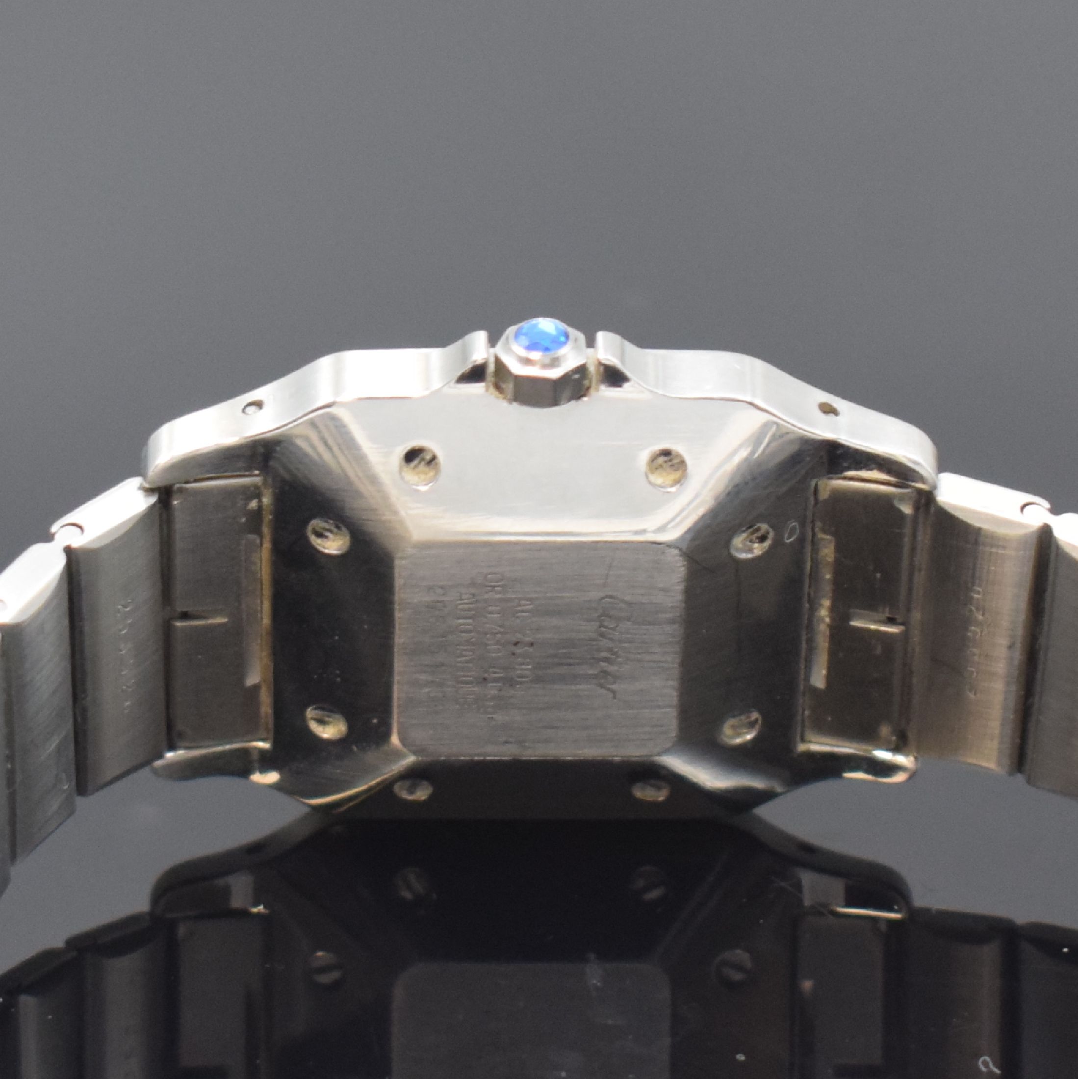 Detail d: CARTIER Santos Herrenarmbanduhr, Schweiz um 1985, Automatik, Edelstahl/Gold kombiniert inkl. Gliederband m. Faltschl., Monocoque- Geh., Lünette ...