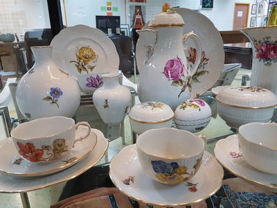 26715881b - Coffee service, Ludwigsburg, 20th century, floral decoration, coffee pot, sugar bowl, 6 cups with saucers, one saucer slightly damaged, lidded box, six dessert plates, with additional parts slightly different in decor: basket bowl, lidded box in egg shape, large flower vase, H. 19 cm, two vases H. 10-17 cm, four small plates, Fürstenberg vase