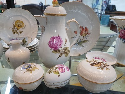 26715881d - Coffee service, Ludwigsburg, 20th century, floral decoration, coffee pot, sugar bowl, 6 cups with saucers, one saucer slightly damaged, lidded box, six dessert plates, with additional parts slightly different in decor: basket bowl, lidded box in egg shape, large flower vase, H. 19 cm, two vases H. 10-17 cm, four small plates, Fürstenberg vase