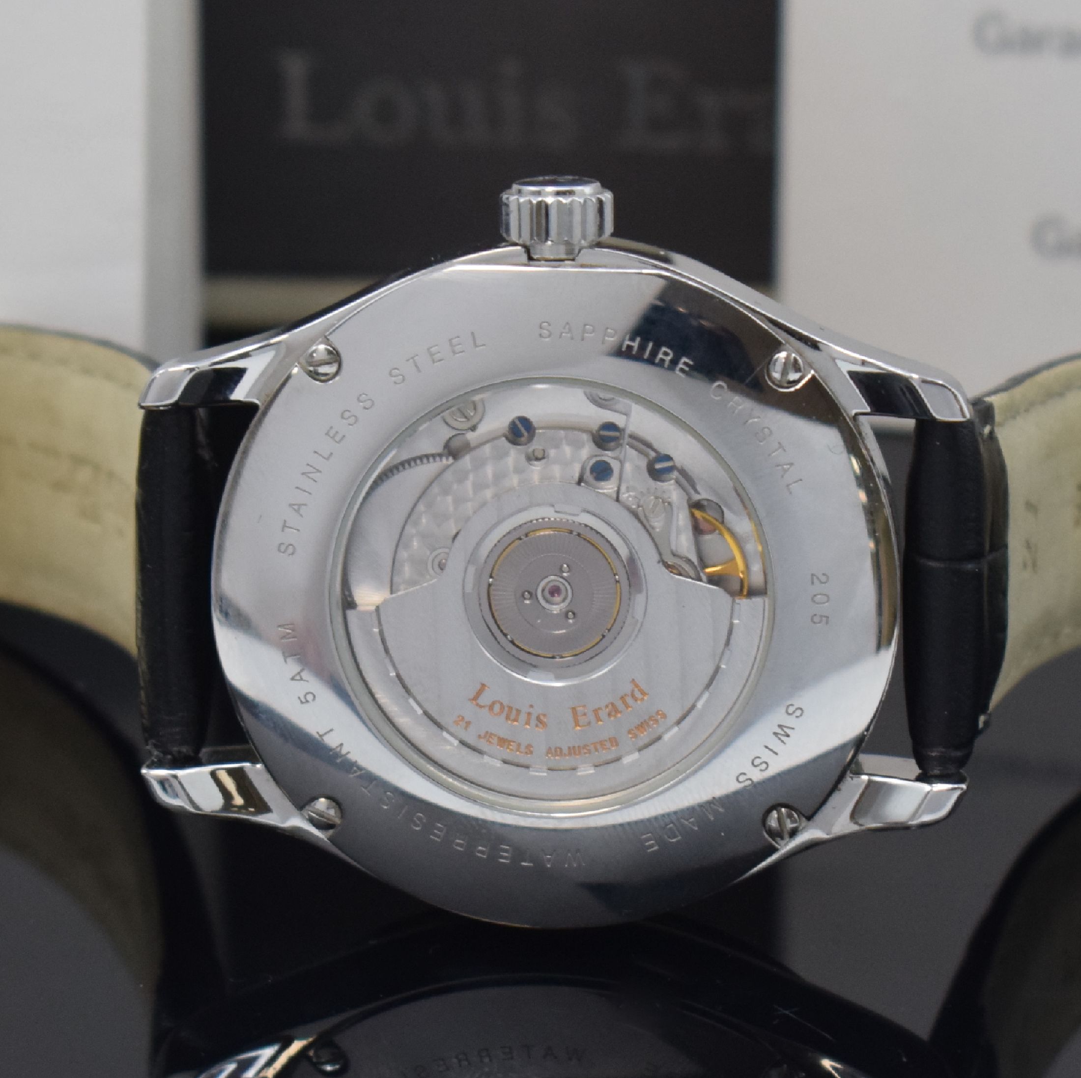 Detail d: LOUIS ERARD Herrenarmbanduhr 1931 GMT Skeleton Big Date Referenz 94205AA02, Automatik, Edelstahlgeh. inkl. orig. Lederband m. dopp. Faltschl., beids. ...