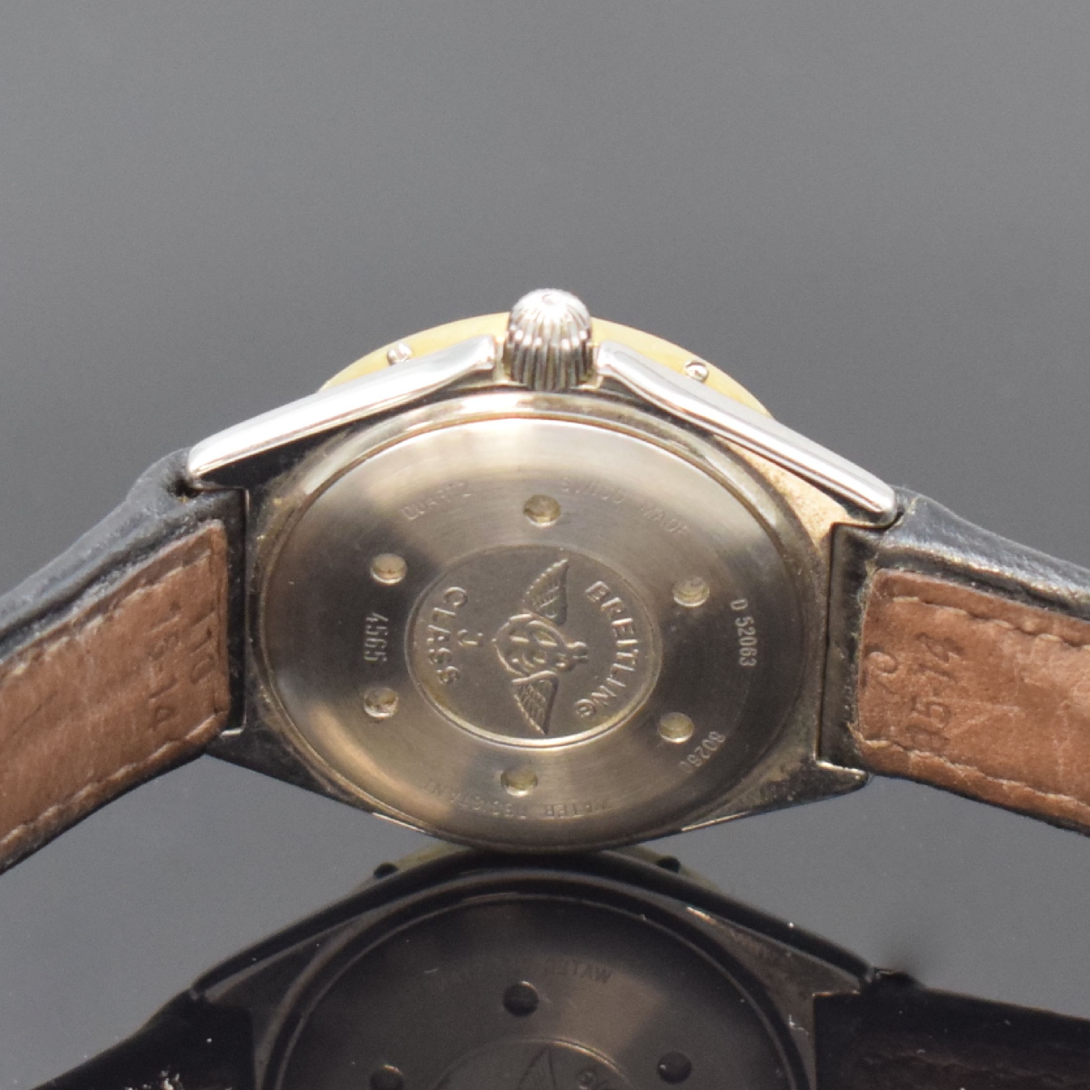 Detail d: BREITLING J Class Damenarmbanduhr in Stahl, Schweiz um 1990, quarz, orig. Lederband m. Dornschl., Boden u. Krone verschr., Goldlünette eins. drehb., ...