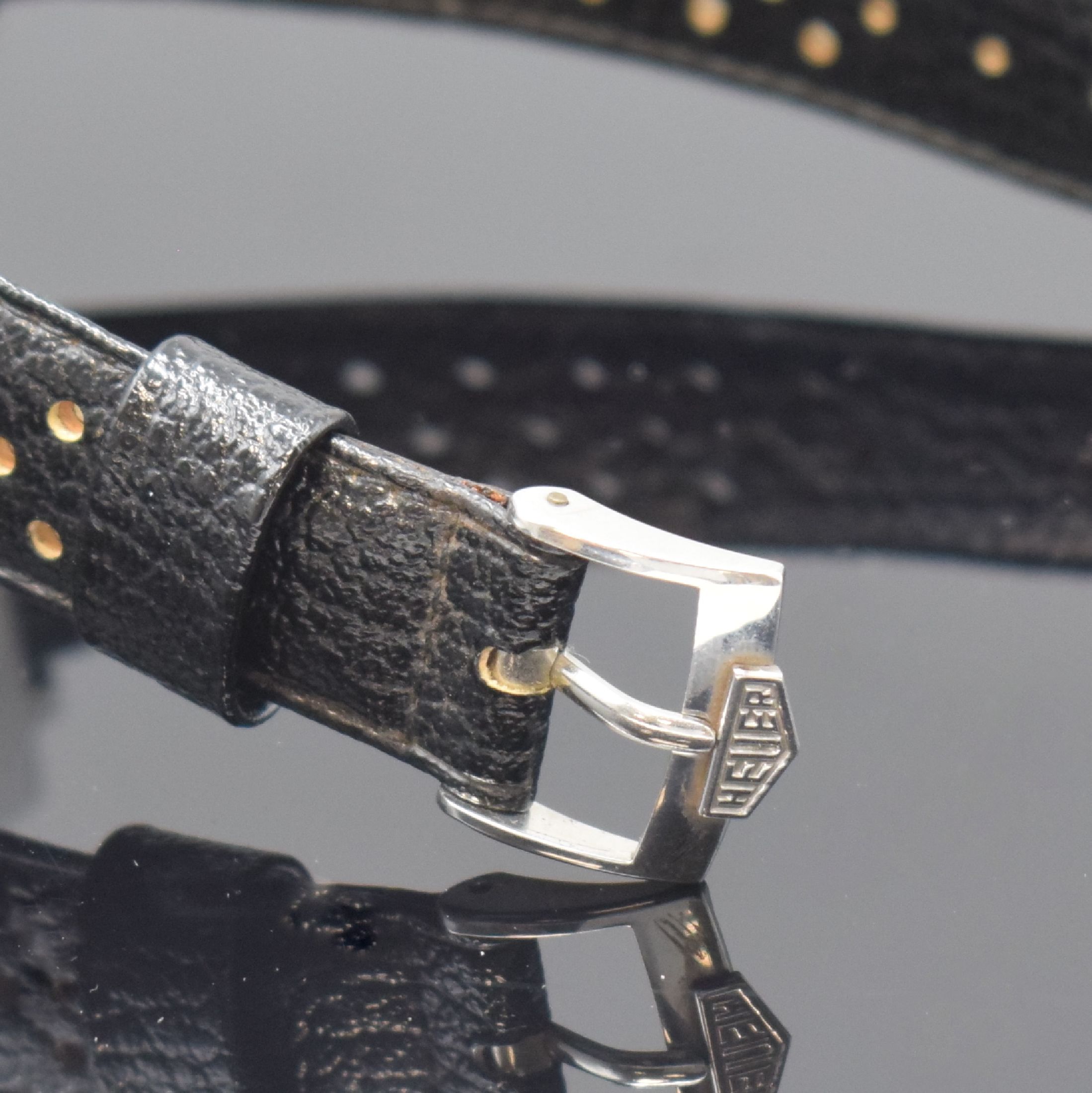 Detail b: HEUER Monaco "Steve McQueen" Herrenarmbanduhr mit Chronograph Referenz 1133, Schweiz um 1972, Automatik, Monocoque-Geh. in Stahl inkl. ...