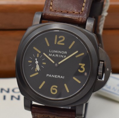 26717187a - PANERAI very rare, limited gents wristwatch Luminor Marina Pre Vendome reference 5218 - 203/A no. 0043, manual winding, produced in a limited edition to 200 pieces, big, cushion shaped, water resistant to 30 ATM, stainless steel PVD-coated, military divers watch with original leather strap and original buckle, 3 piece construction, satine black, case, screwed down case back, straight lugs, windingcrown with patented security lever to wind thewatch under water, sapphire crystal, black dial with luminous Arabic numerals and indices, small Sek at 9, black baton hands, rhodium plated movement, 17 jewels, calibre ETA (UT6497), fausses cotes decoration, monometallic balance, flat hairspring, shock- absorber, measures approx. 44 x 44 mm, original mahogany-box with original covering box, hang tag, additional original leather strap with original buckle and original papers, sold in June 1996, condition 2, one ofthe most sought after Panerai, property of a collector