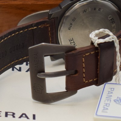 26717187b - PANERAI very rare, limited gents wristwatch Luminor Marina Pre Vendome reference 5218 - 203/A no. 0043, manual winding, produced in a limited edition to 200 pieces, big, cushion shaped, water resistant to 30 ATM, stainless steel PVD-coated, military divers watch with original leather strap and original buckle, 3 piece construction, satine black, case, screwed down case back, straight lugs, windingcrown with patented security lever to wind thewatch under water, sapphire crystal, black dial with luminous Arabic numerals and indices, small Sek at 9, black baton hands, rhodium plated movement, 17 jewels, calibre ETA (UT6497), fausses cotes decoration, monometallic balance, flat hairspring, shock- absorber, measures approx. 44 x 44 mm, original mahogany-box with original covering box, hang tag, additional original leather strap with original buckle and original papers, sold in June 1996, condition 2, one ofthe most sought after Panerai, property of a collector