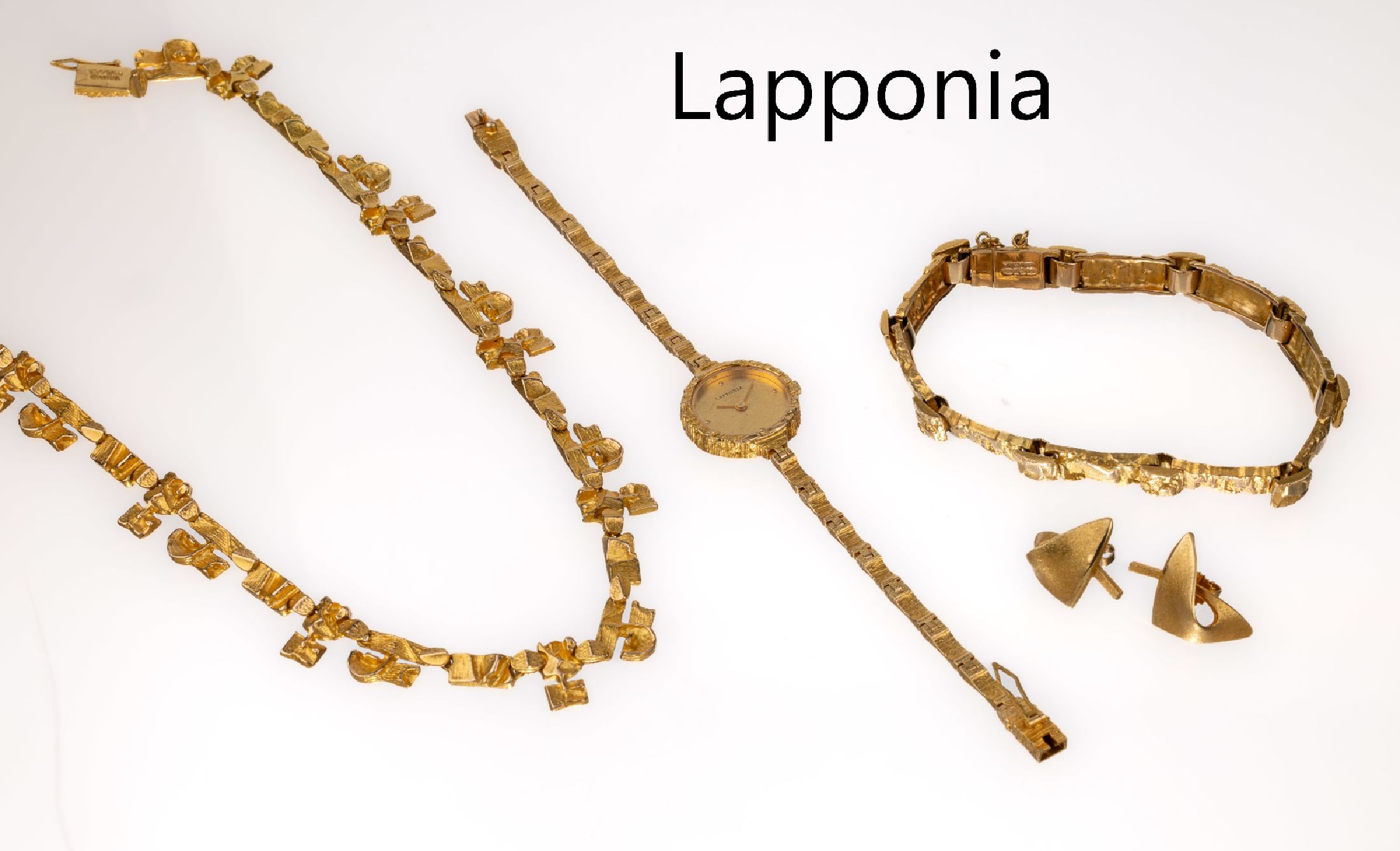 14 kt Gold LAPPONIA Schmuckset, GG 585/000,sign. und punz., best. aus: Collier L. ca. 42 cm, Kastenschloss mit Sicherheitsacht, ArmbandL. ca. 20 cm, ...