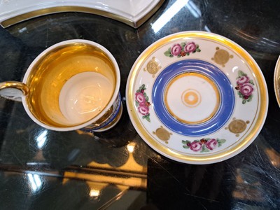 26718492d - 3 Biedermeier cups with saucers, German, mid- 19th century, porcelain, with various colorful floral paintings and wide gold edges, these rubbed, height approx. 8cm each